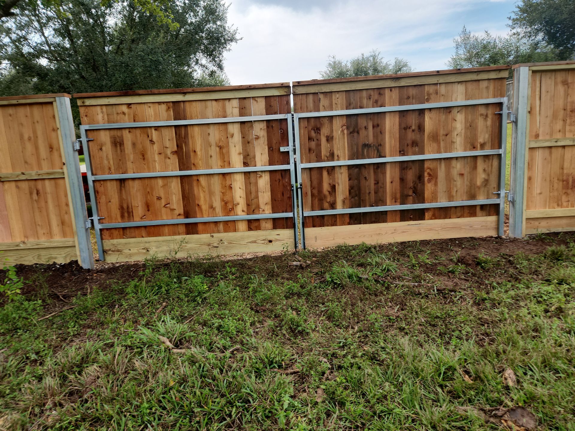 Wood Fence Installation for HOA by Tim's Fences