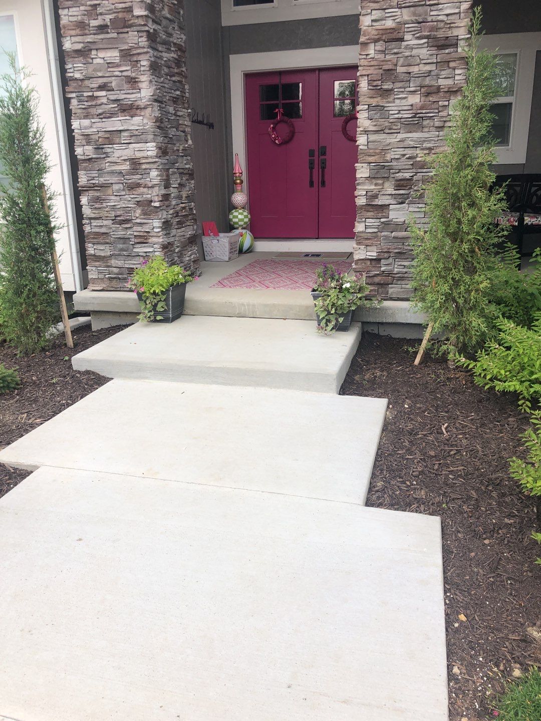 Overland Park -- Front Porch with Tuscan Flagstone Overlay by Big Red Decorative Concrete, LLC