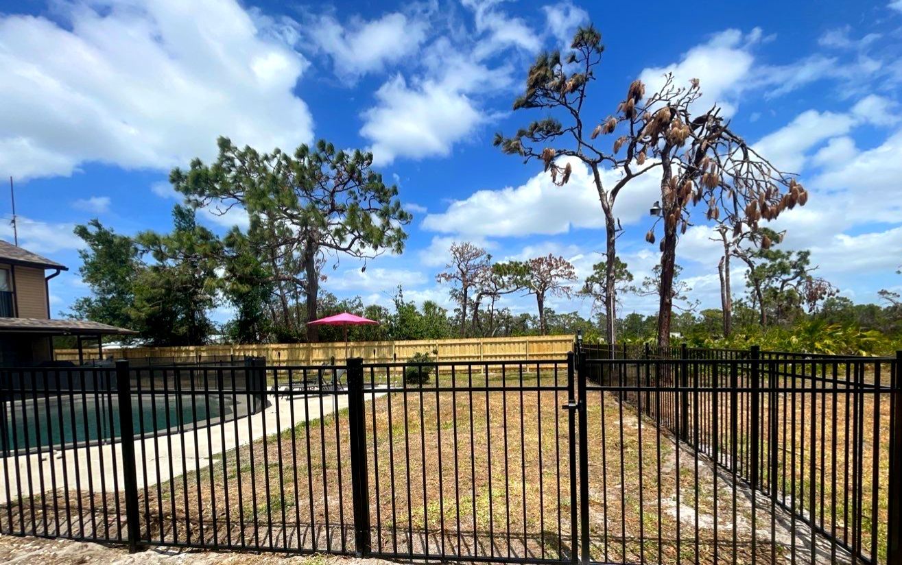 Black Aluminum 3 Rail Fence and Treated Wood Board on Board Privacy Fence  by Asap fence and gates, LLC