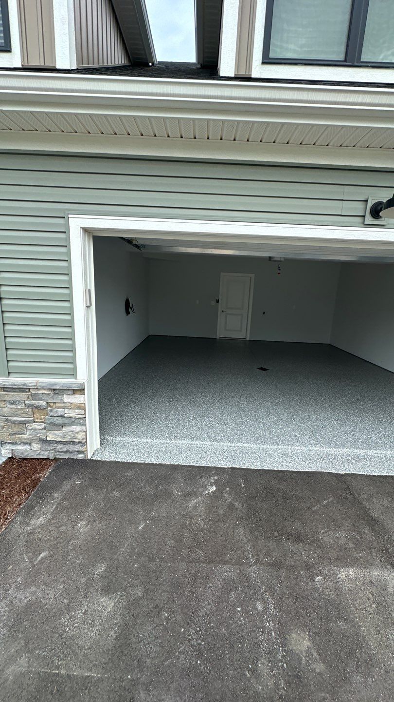 Porch + Garage Project in Evans City by Floors in a Day, Inc