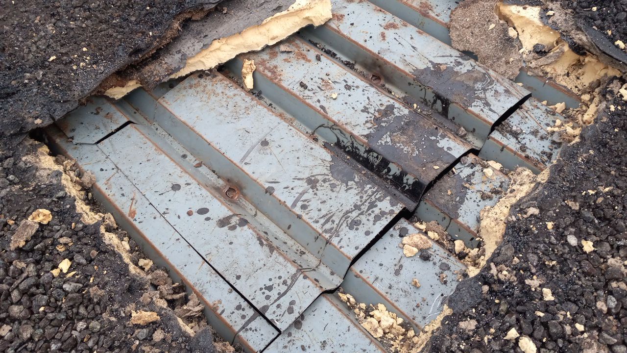 Commercial Roofing Repair using Everest Silicone Coating by Georgia Roof Advisors