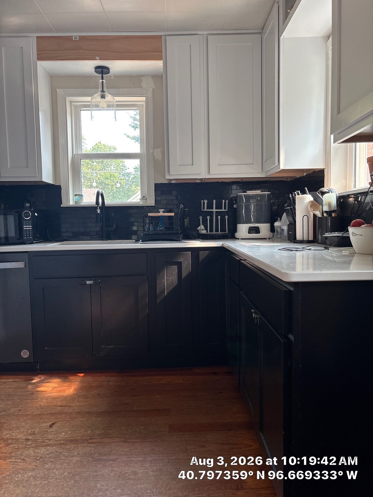 Lincoln Kitchen Remodel With Black and White Two-Tone Cabinetry by CompanyCam Sales Demo
