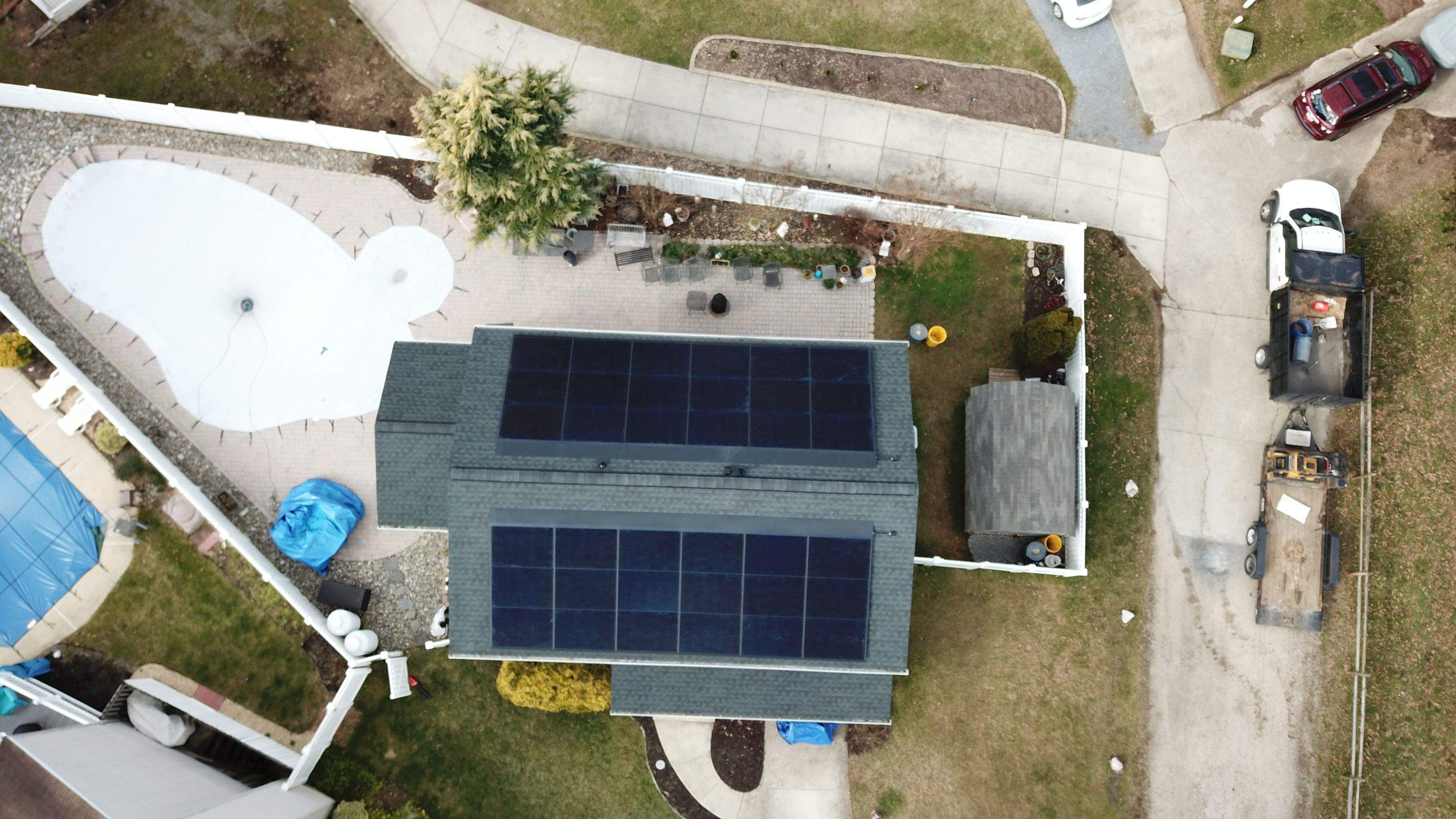 Roof Replacement with GAF Decotech integrated solar panels by American Home Contractors