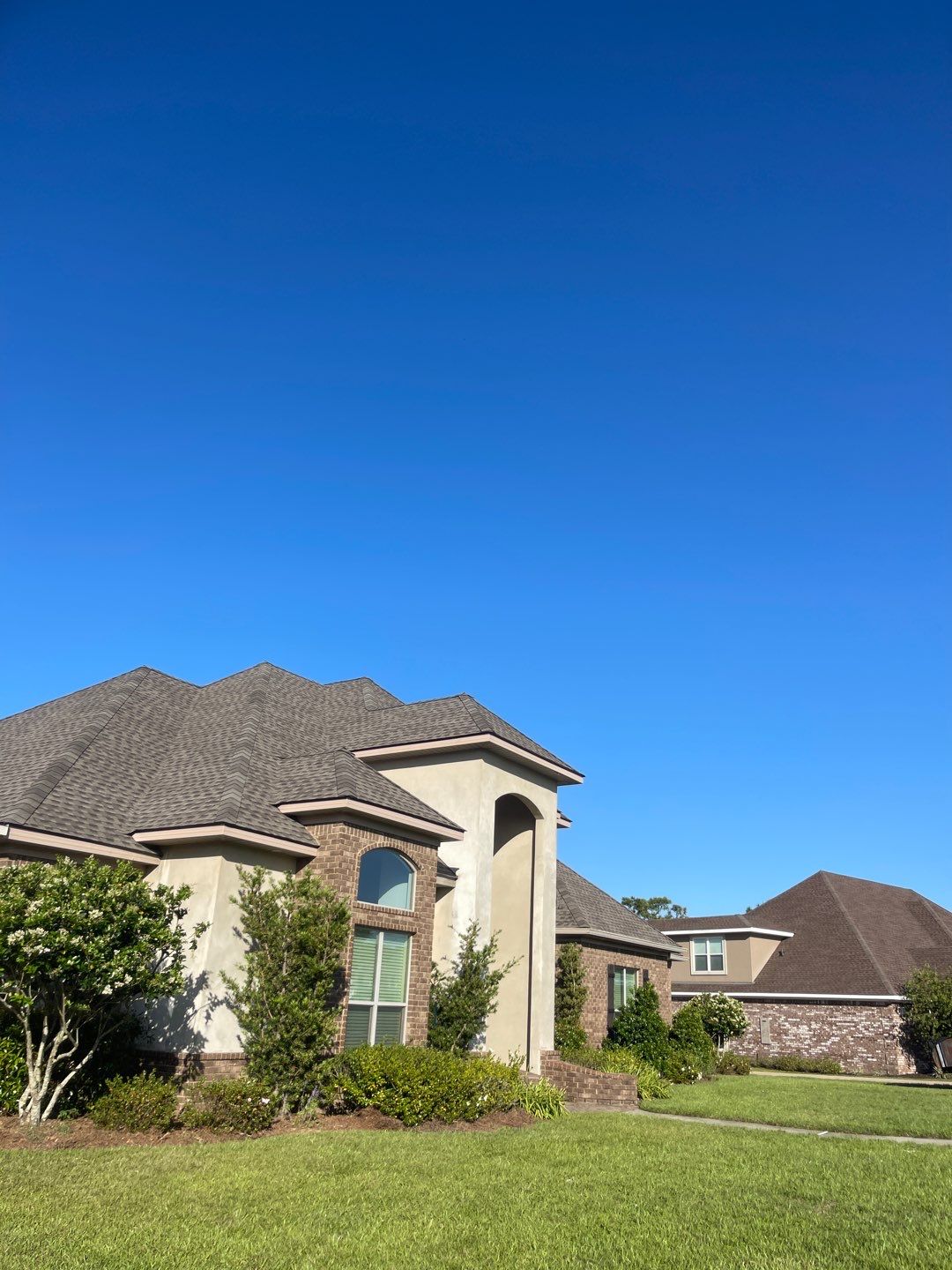 Residential Roofing Installation using Roof Replacement by American Roofing & Construction LLC