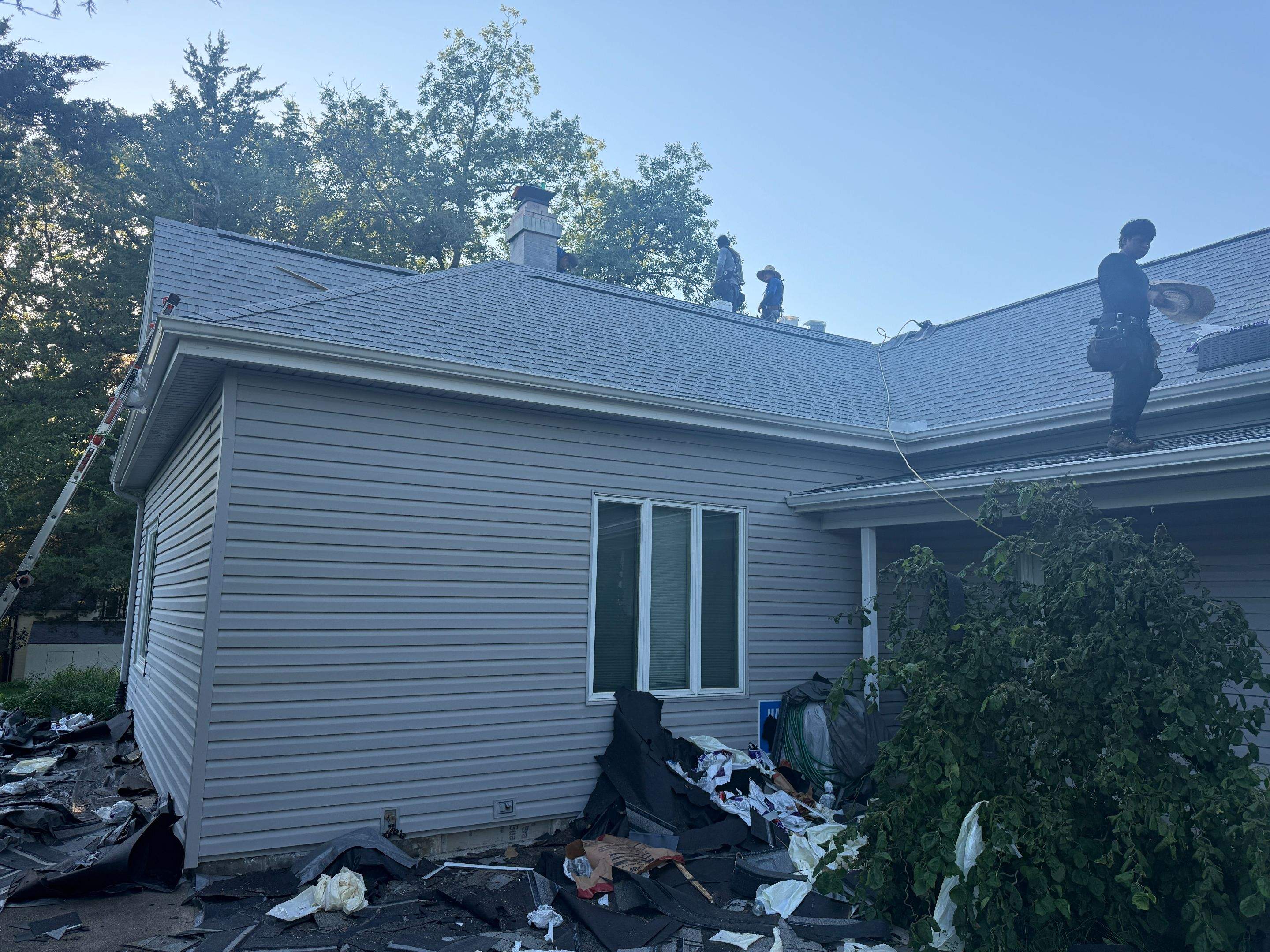 Asphalt Shingle and EPDM Membrane Roof Installation in Mineola by Star Home