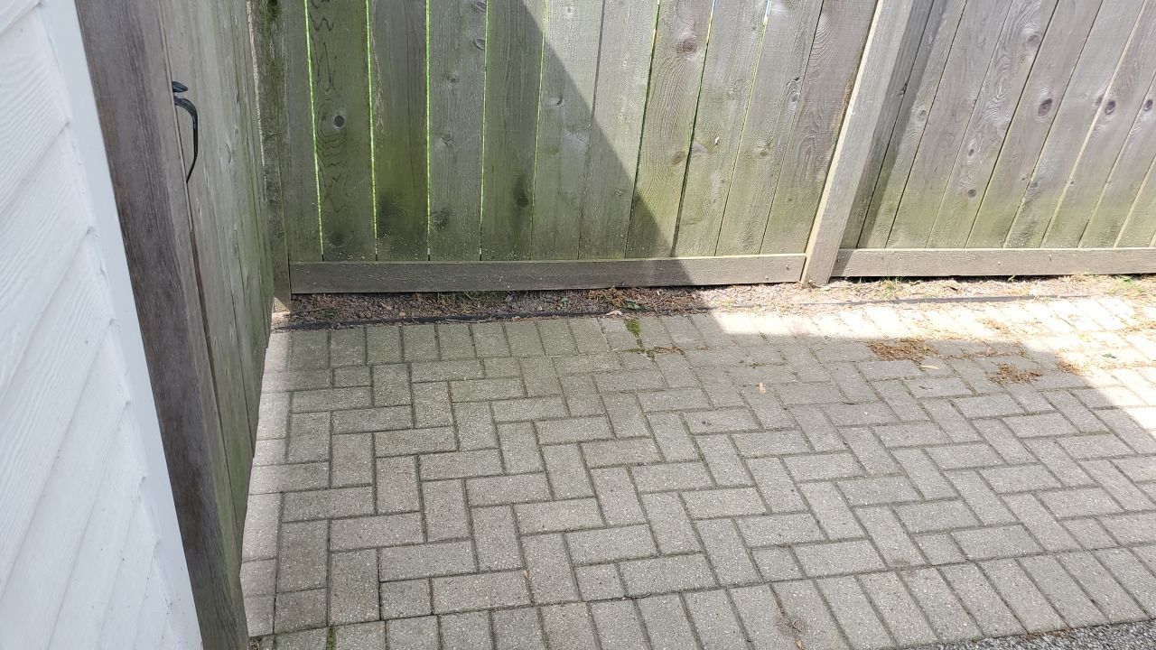 Brick patio repair, clean sand and seal by Northern Power Washing LLC.