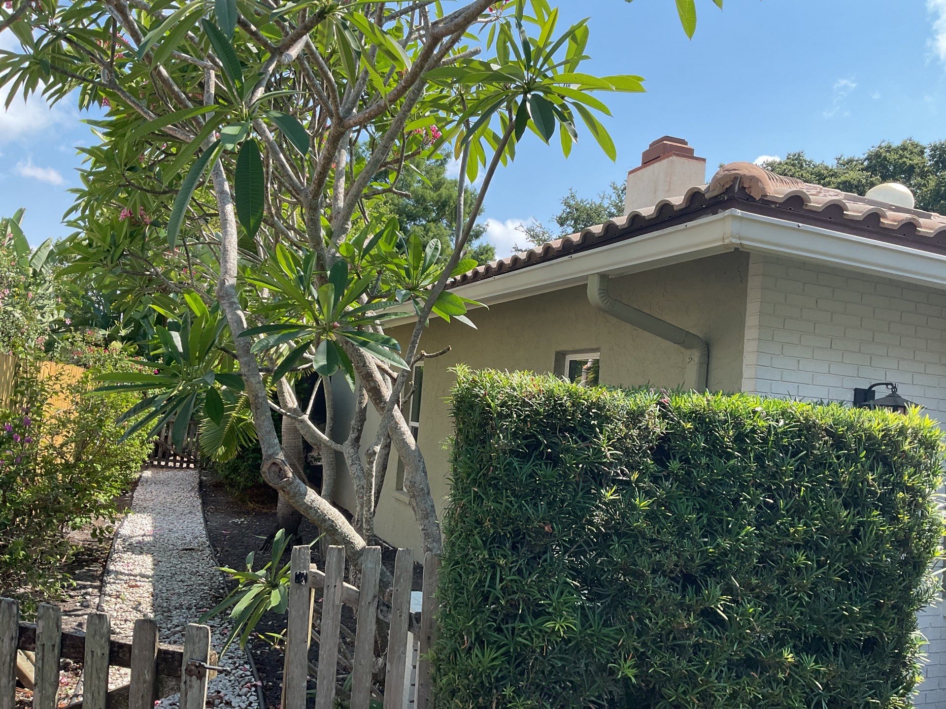 White Gutter Installation in Sarasota FL by Gutter Professors