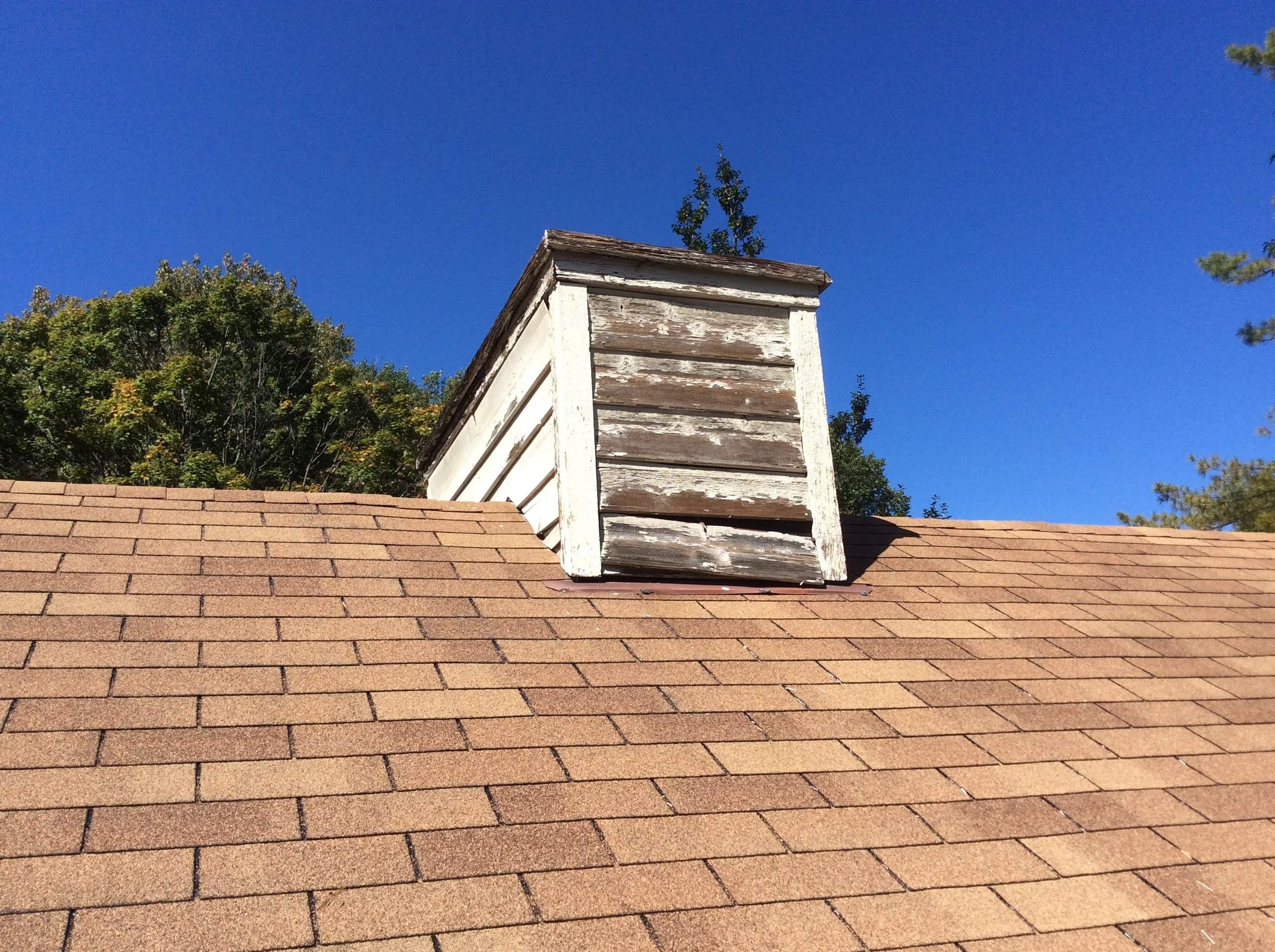 Residential Roofing Installation using Pewterwood Shingles  by Alpha Design Services