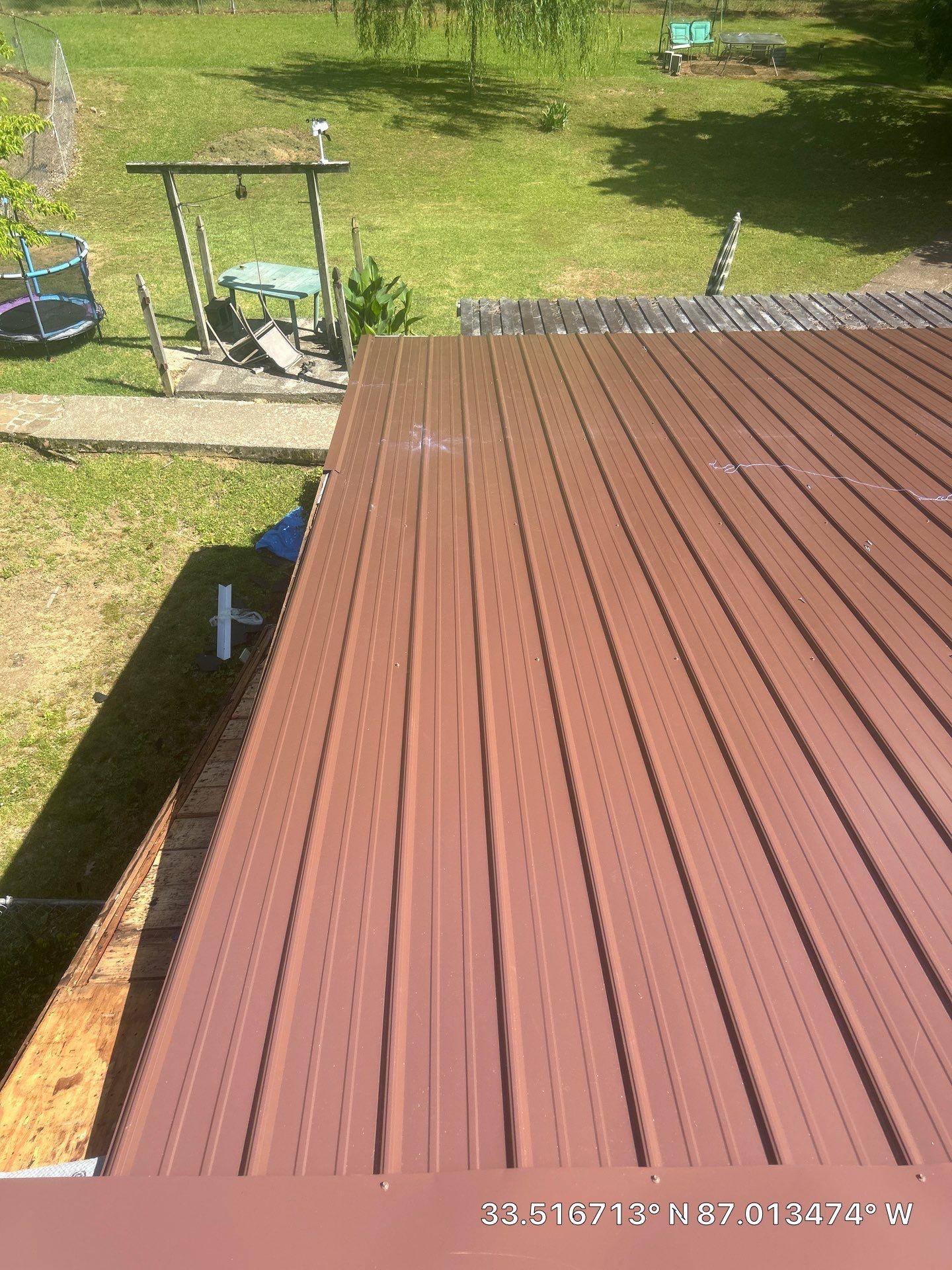 Metal Roof Replacement in Sylvan Springs (Brown) by The Roofing Dudes