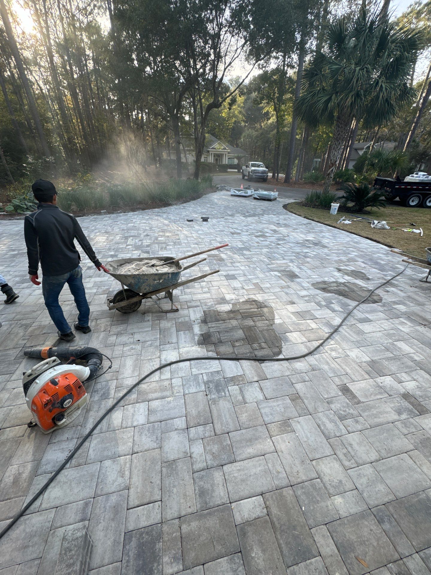 Custom Paver Driveway and Textured Pool Deck Installation in Hilton Head Island by Lowcountry Scapes, LLC