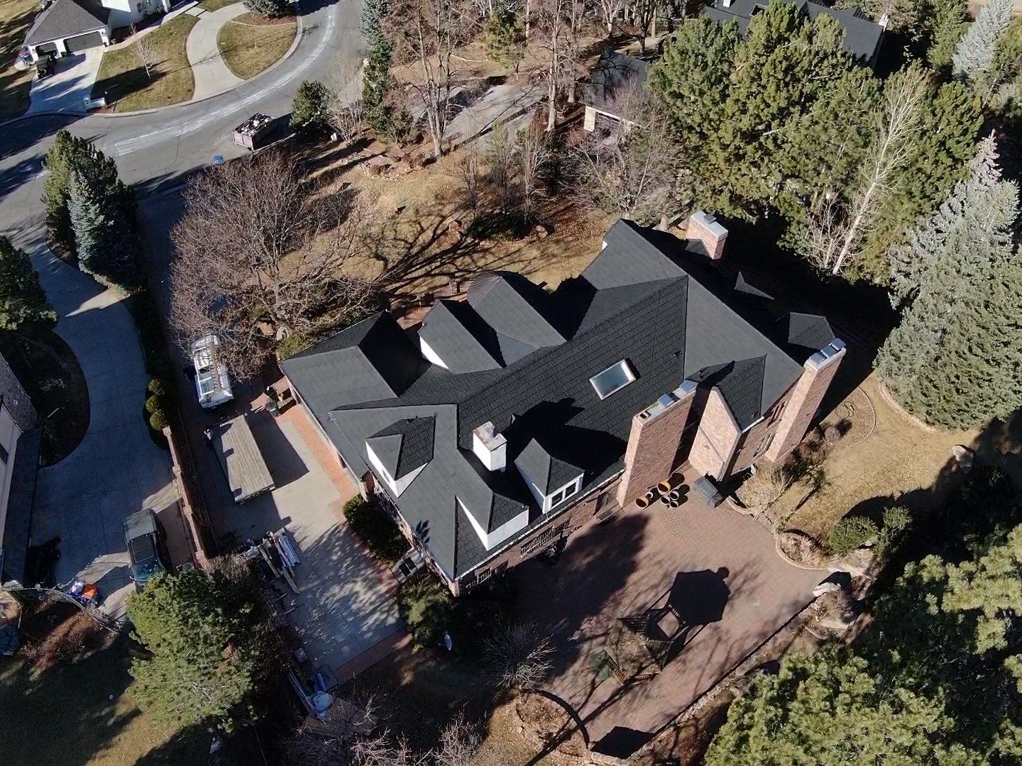 Unified Stone Coated Roof & Stucco Remodle by Blue Peaks Roofing LLC