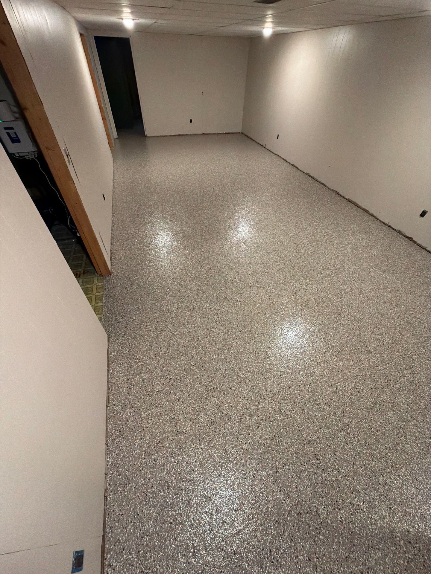 Custom Epoxy Flake Floor Installation for Spring Lake Residence by Gordon Painting