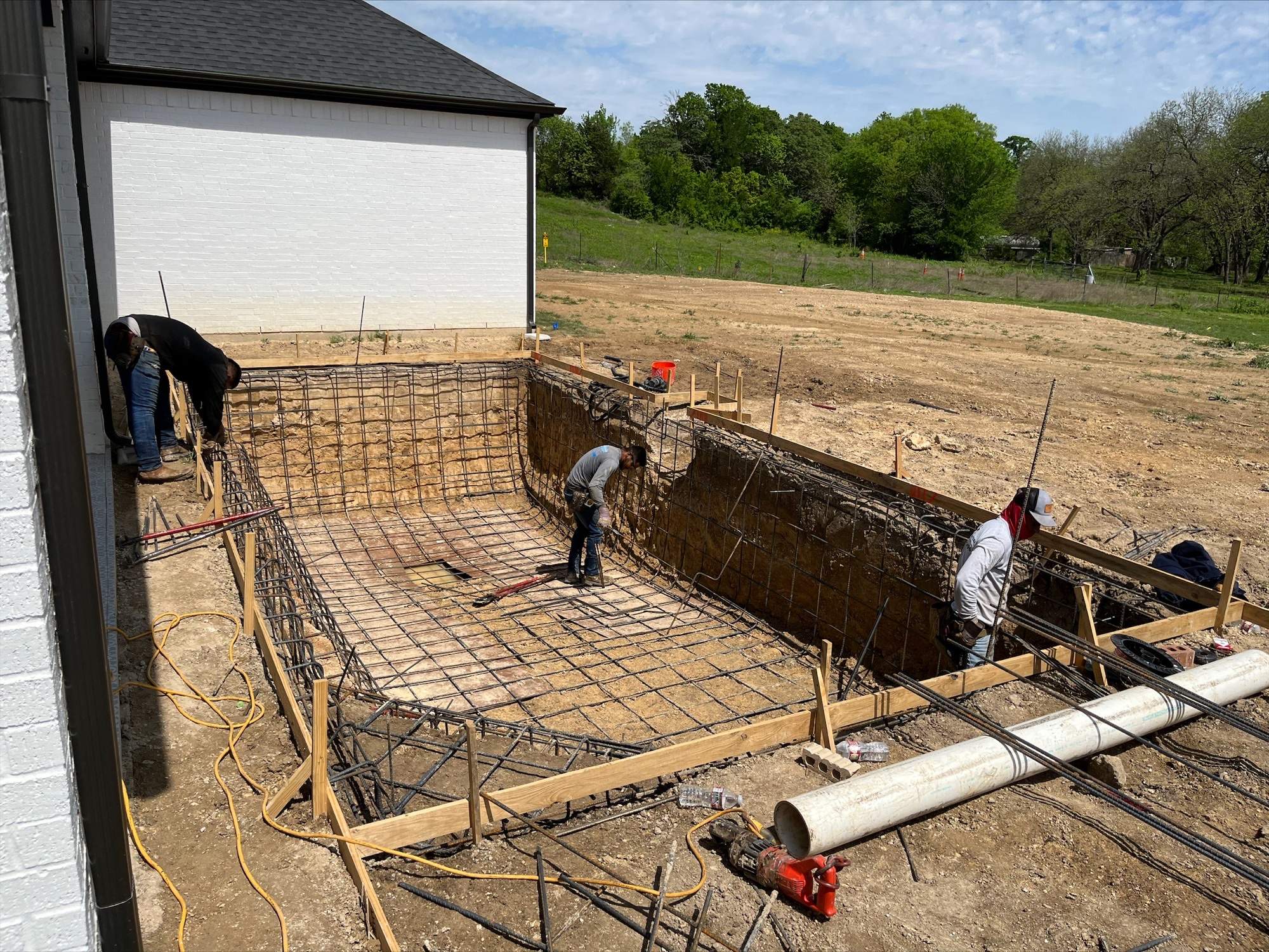 Geometric Pool with Tanning Ledge by Pinnacle Pools and Spas - DFW