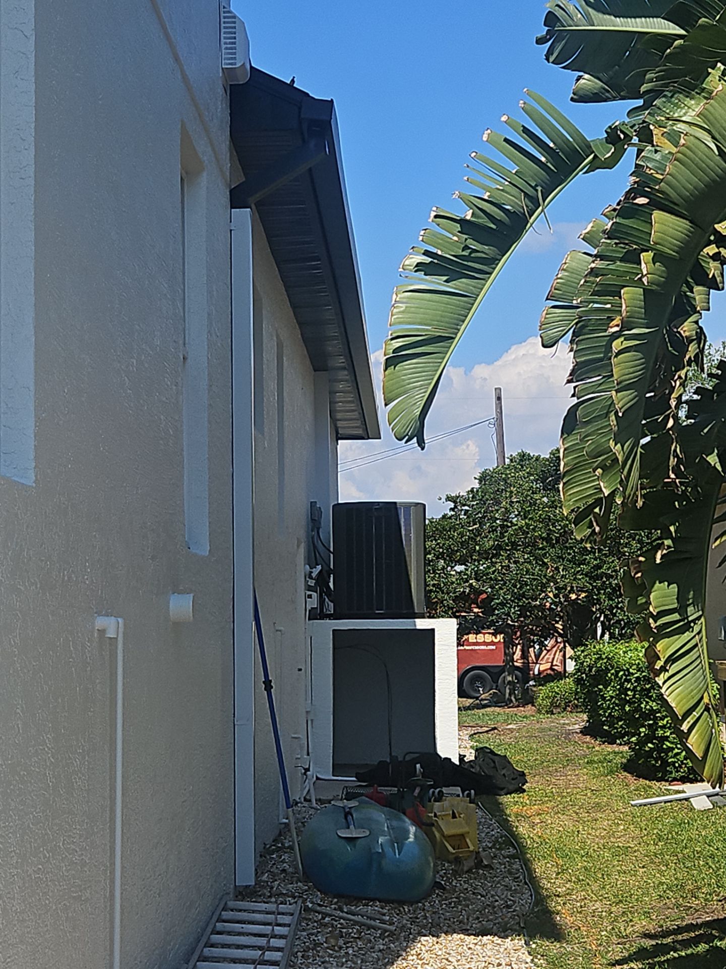 Soffit and Fascia Installation and black seamless gutters in Sarasota FL by Gutter Professors