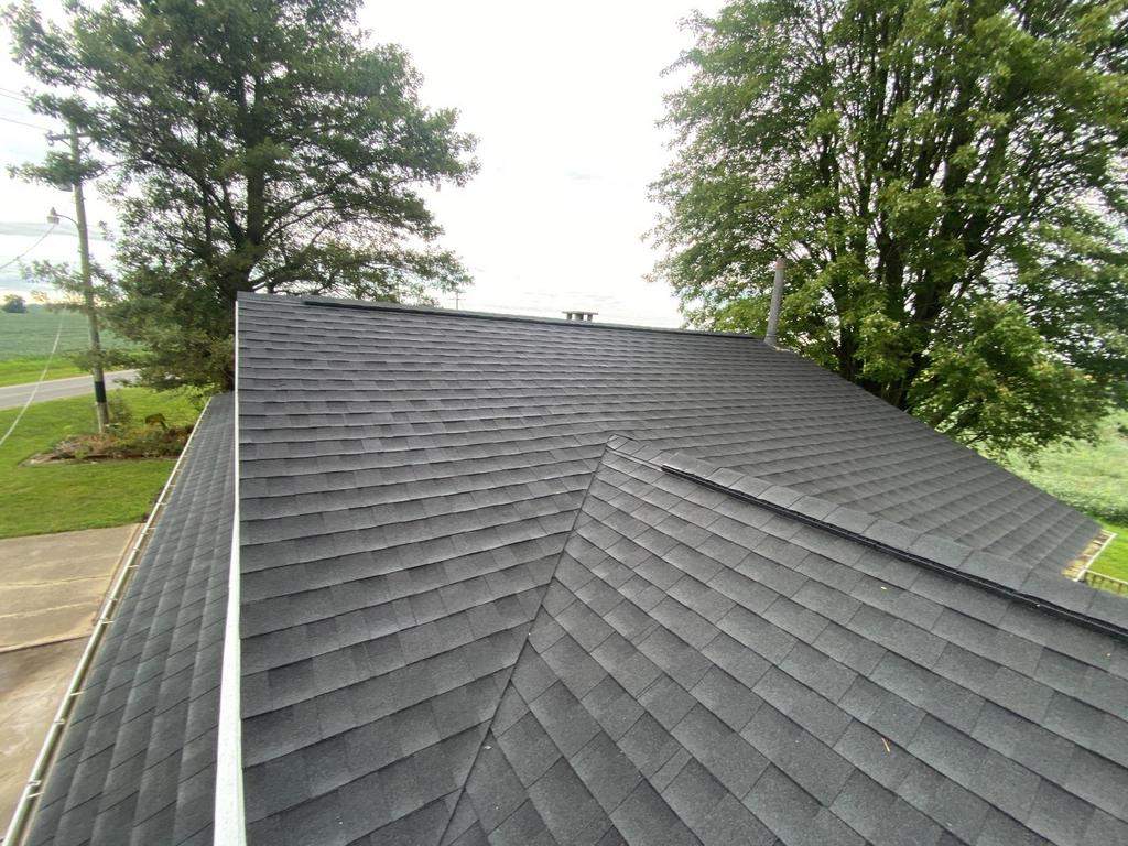 Storm damage roof replacement by Nitro Roofing and Construction