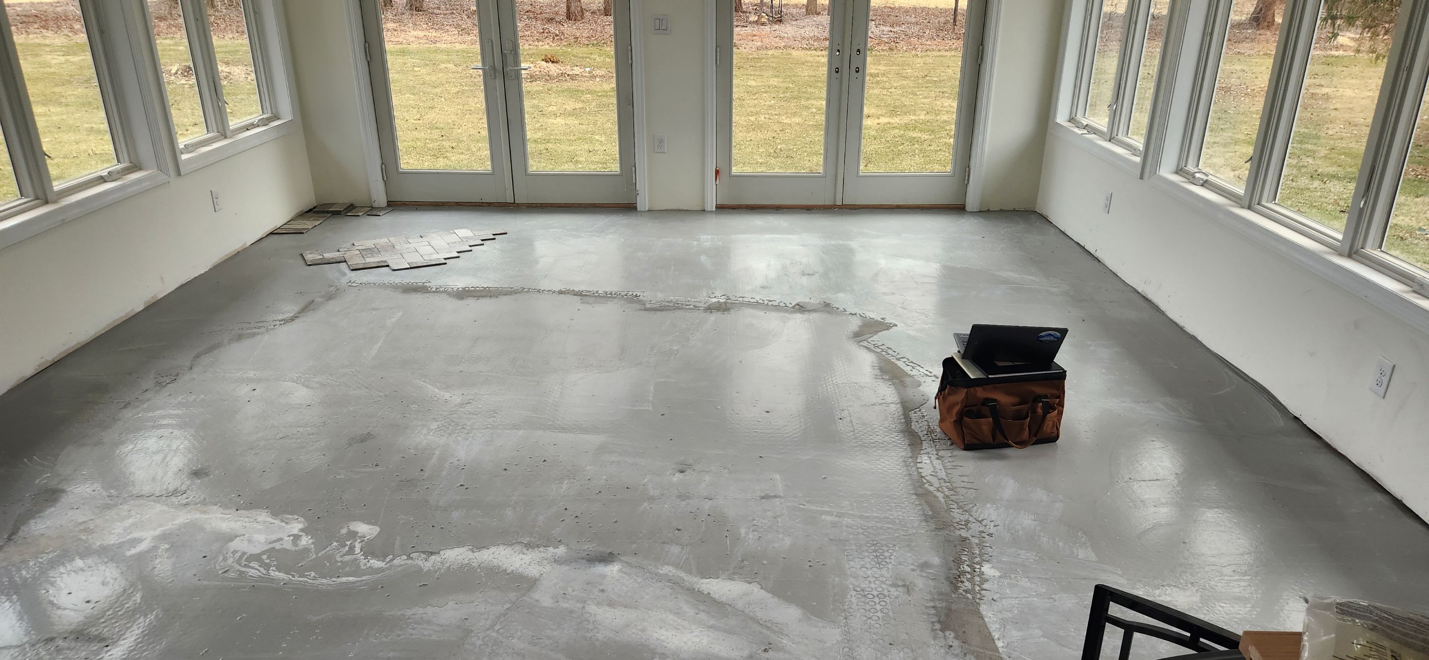 4 Seasons Room with Ditra Heated Floor using multi pattern Subway Tiles by Footprints Floors Morristown