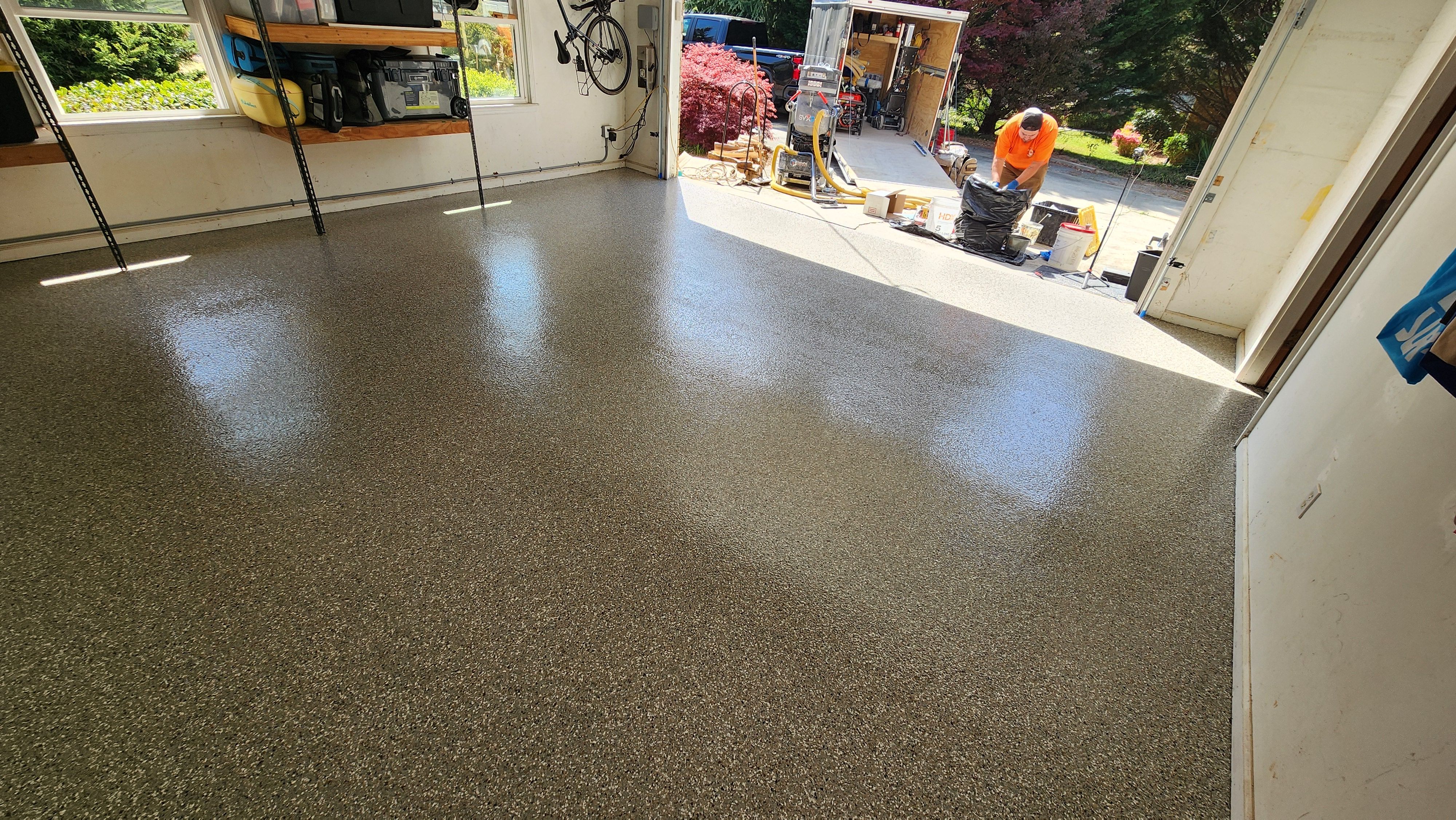 Garage floor transformation with Creekbed flake by Opus Renovations 
