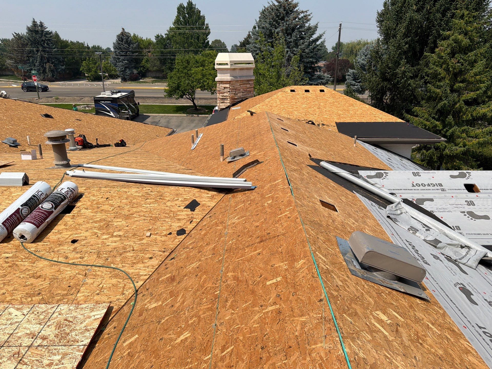 Boise Commercial Roof Replacement with Brown Architectural Shingles by Olive Roofing