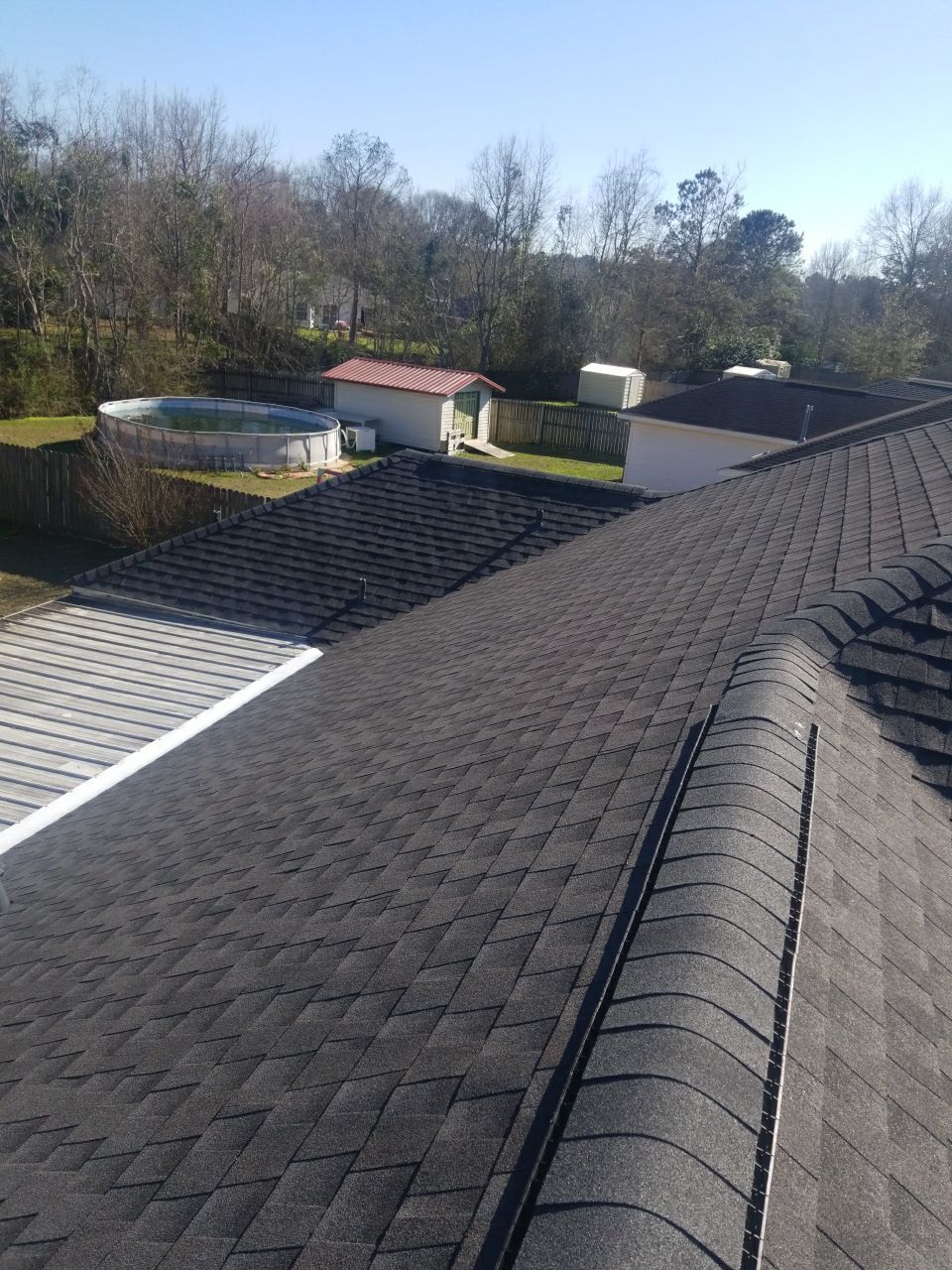 Residential Roofing Installation using Roof Replacement by American Roofing & Construction LLC