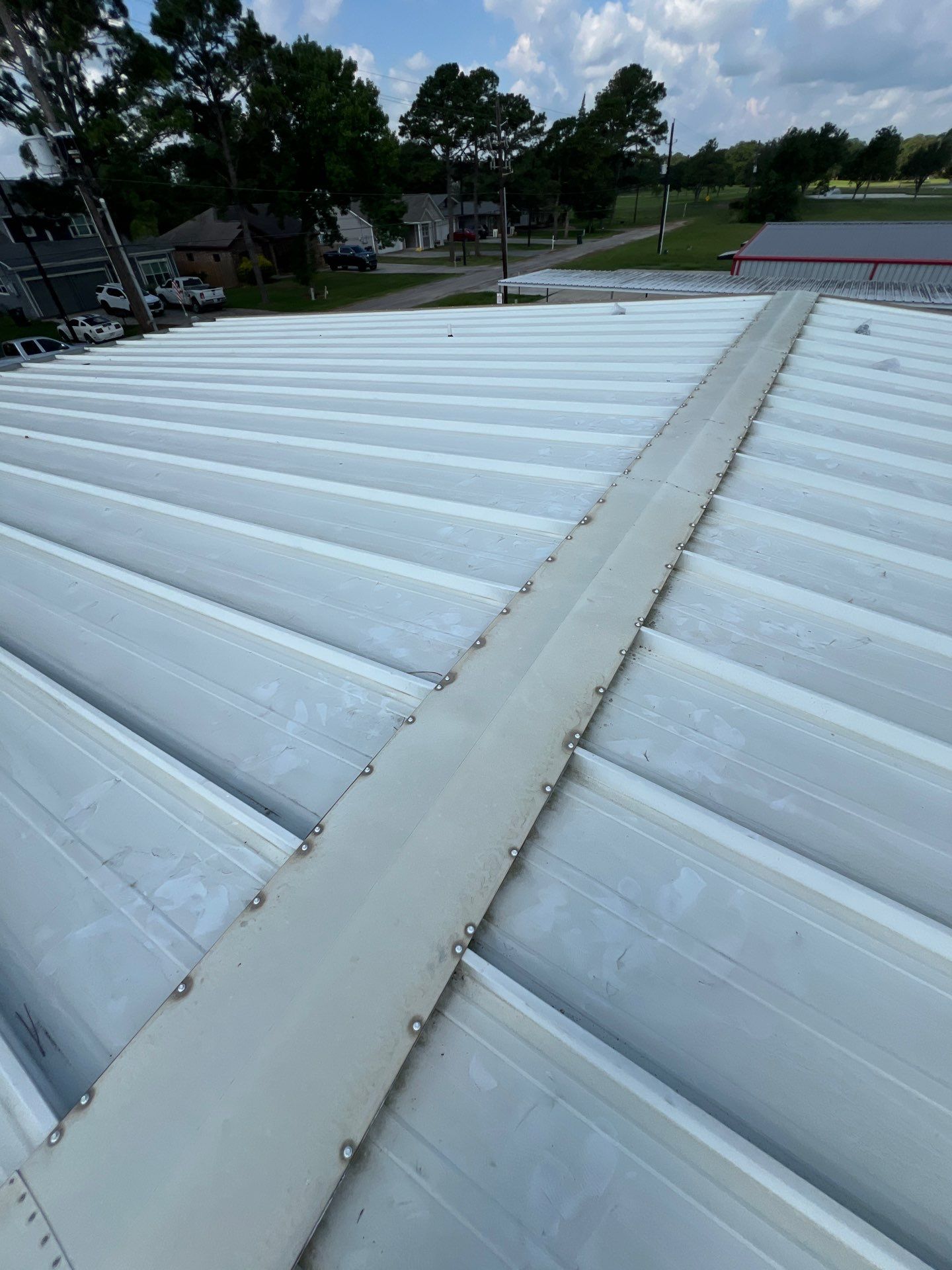 Commercial Roofing Repair using Metal by Roof Repair Company
