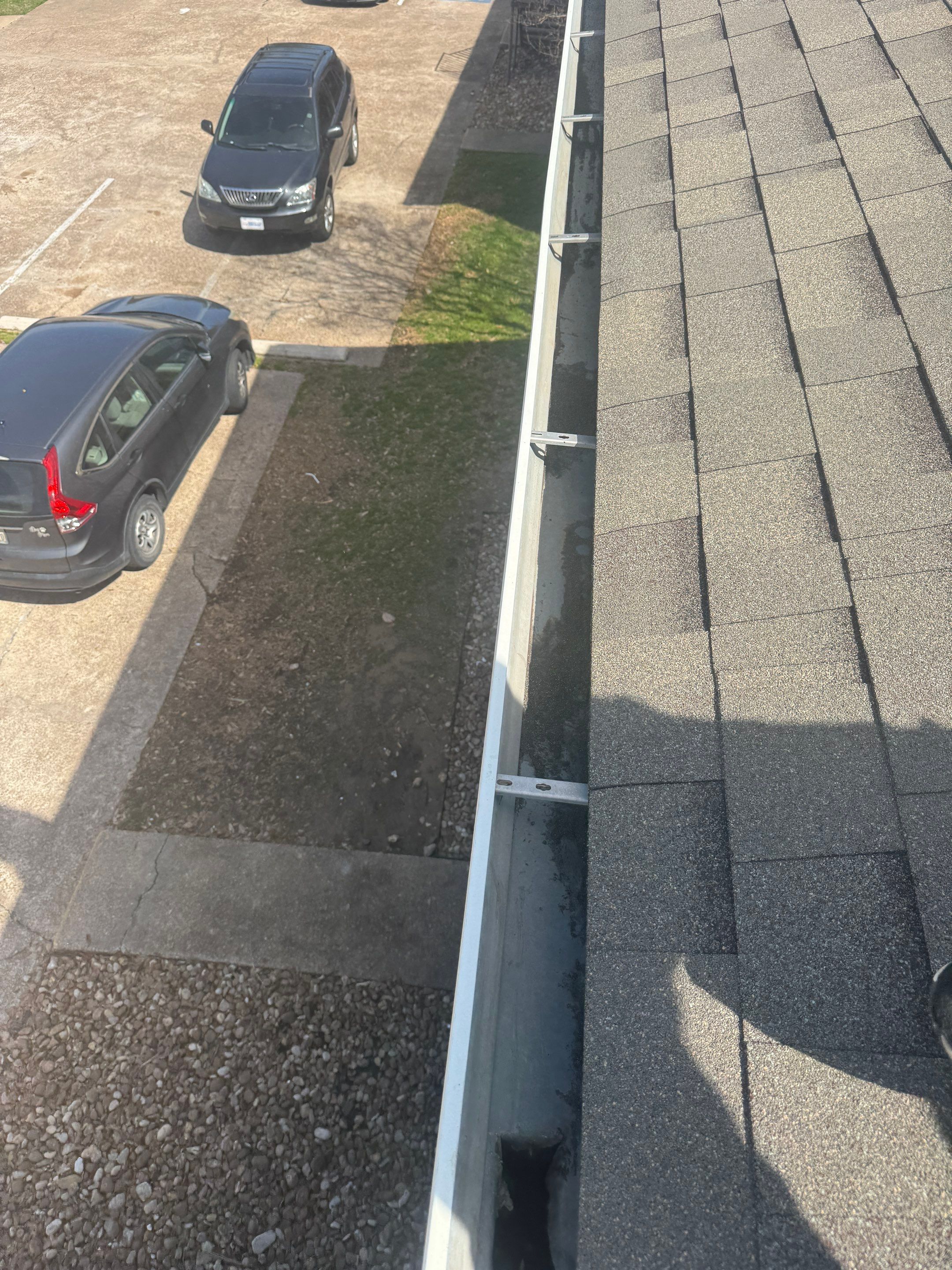 HOA gutter cleaning after photo.