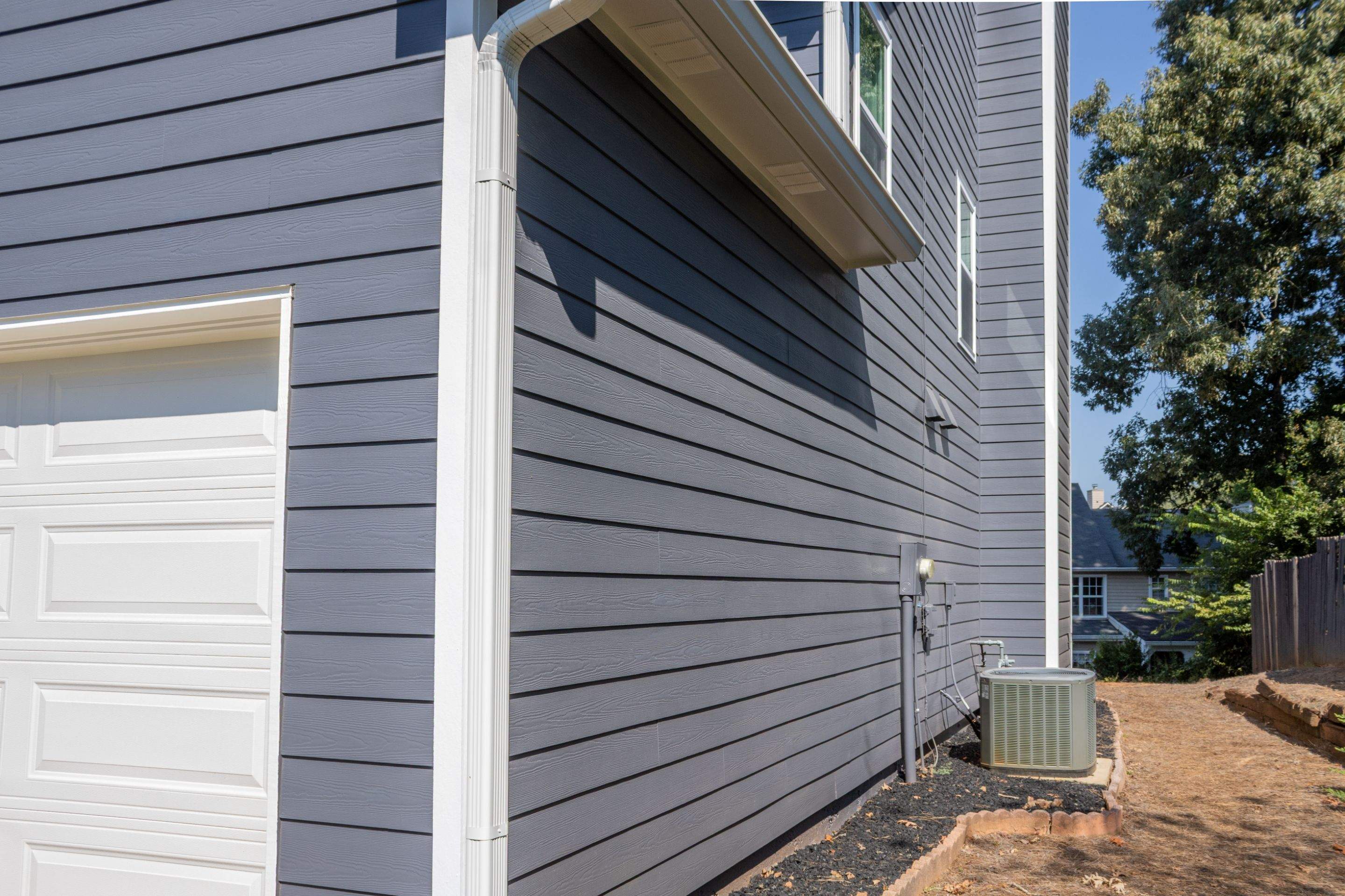 Lawrenceville, GA Full Siding Replacement, Exterior Painting, and Window Installation by Nelson Exteriors 