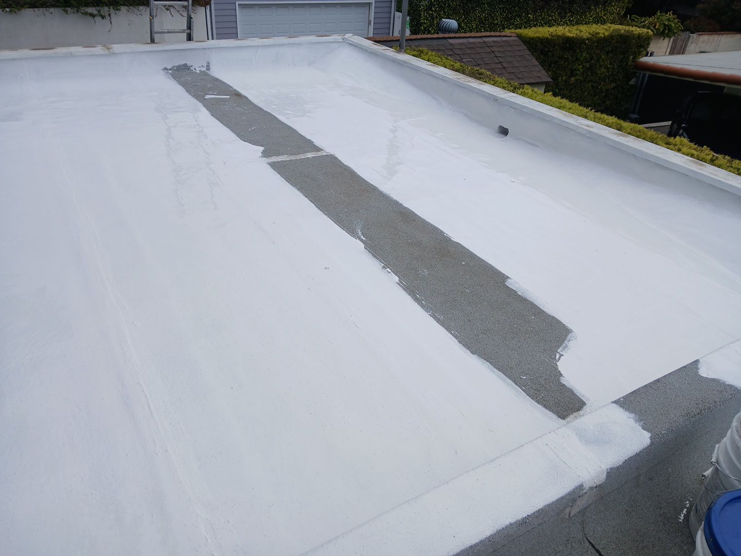 Silicone Membrane Installation using American Standard Coatings Silicone-S by Hull Brothers Roofing