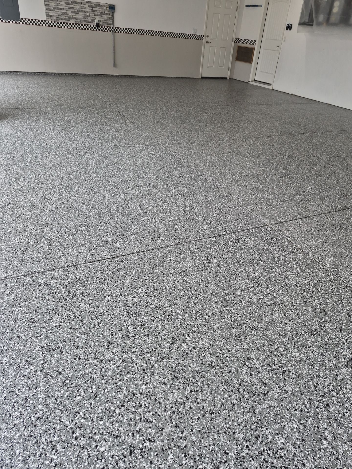 Full Garage Floor Transformation in Smoke 1/4" Flake Finish by Croc Coatings, LLC
