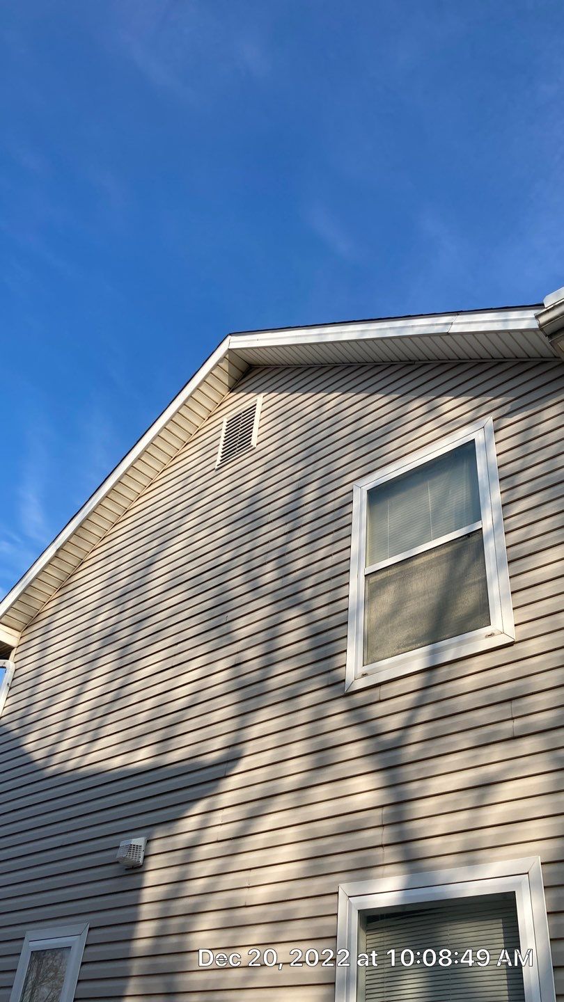 Wind damage to Siding: Insurance paid for full replacement of all siding by Absolute Roofing and Construction