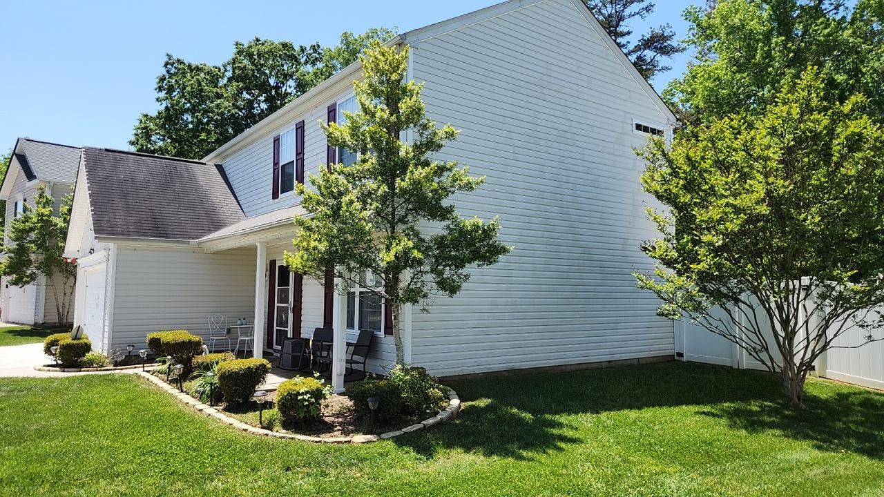 House Wash using cleaner by Power Wash Masters LLC