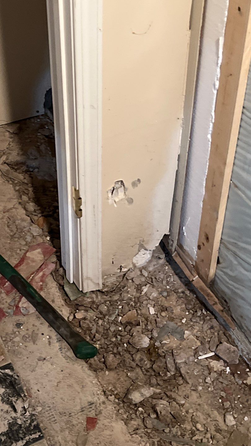 Interior drain tile system installation by ACE Waterproofing & Basement Solutions