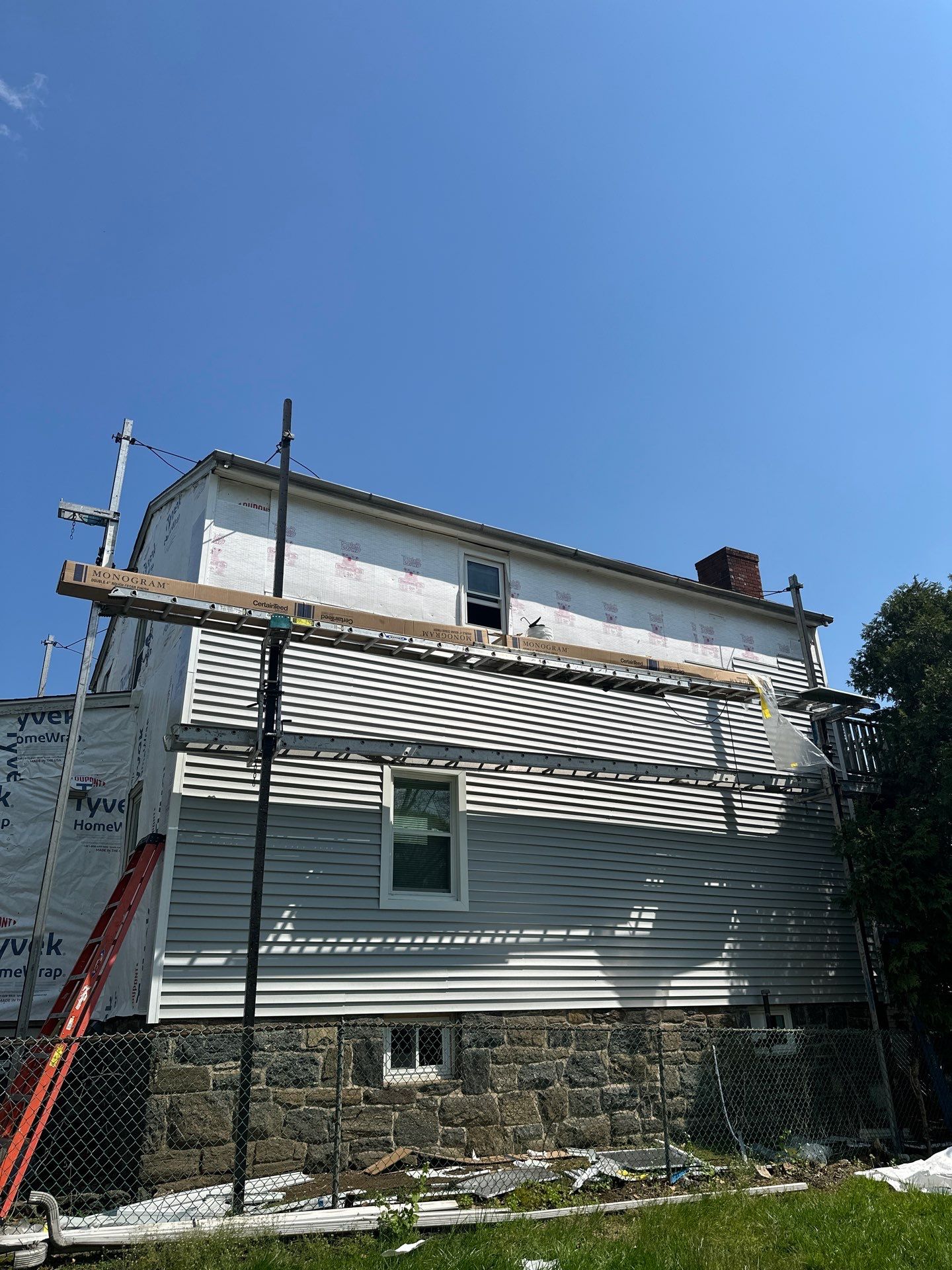 Siding Installation using Certainteed Cedar Impressions Straight Edge Perfection Shingles - D7 - Sterling Gray by A Plus Exterior