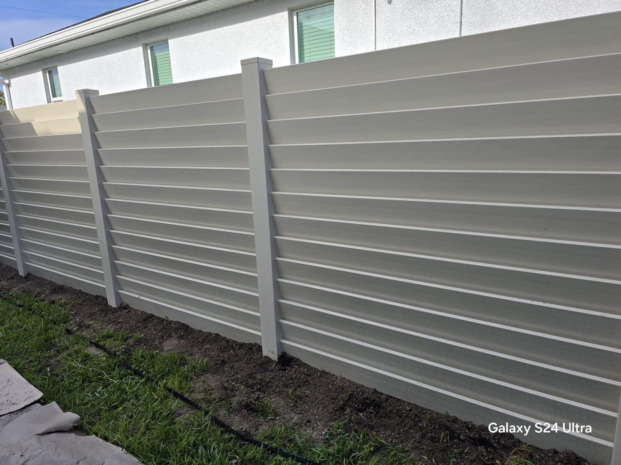 Tan Louvered Vinyl in Port Charlotte by True Fence LLC