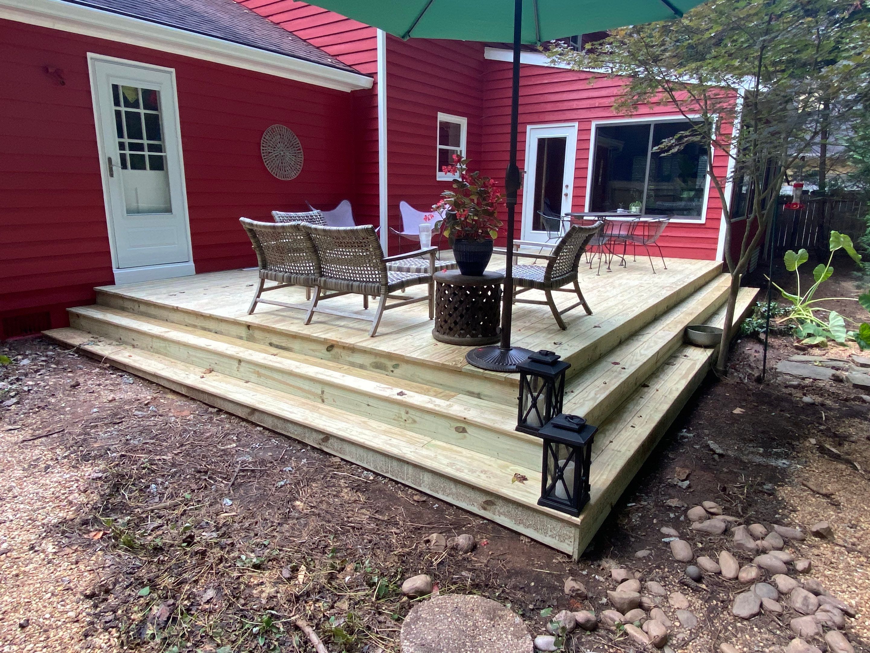 Mableton Exterior Painting and Pressure Treated Wood Deck Installation by Swift Home Renovations
