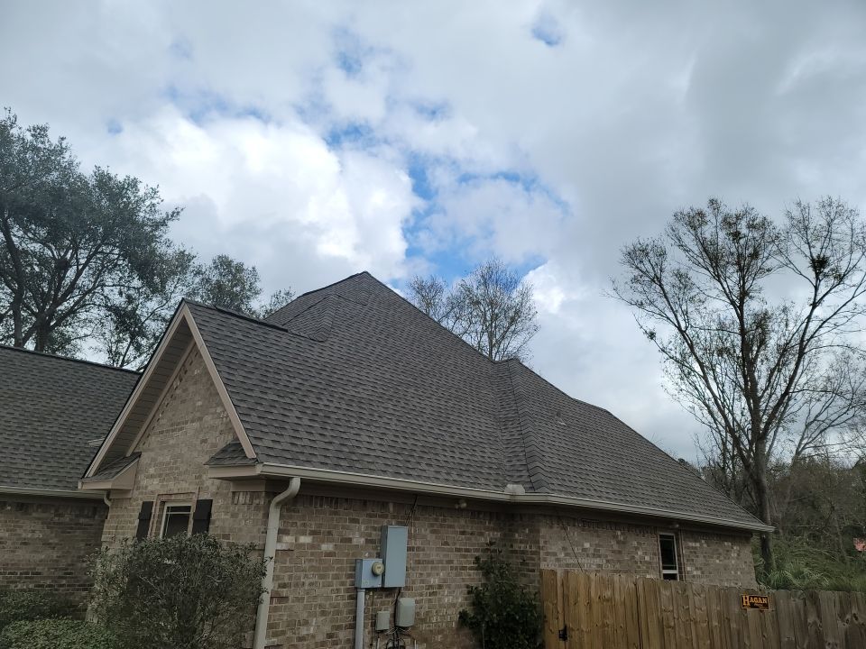 Residential Roofing Installation using Roof Replacement by American Roofing & Construction LLC