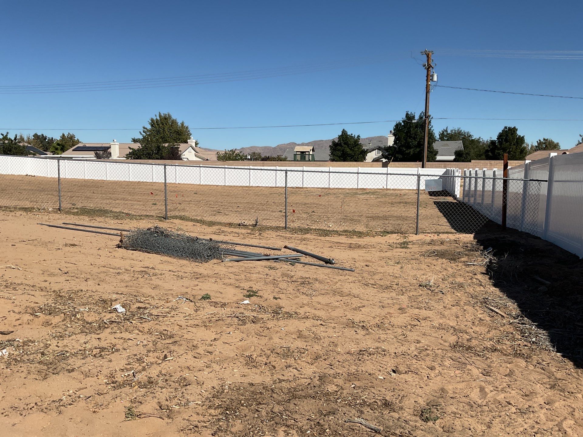 White picket fence  by Fence Guys Inc. 