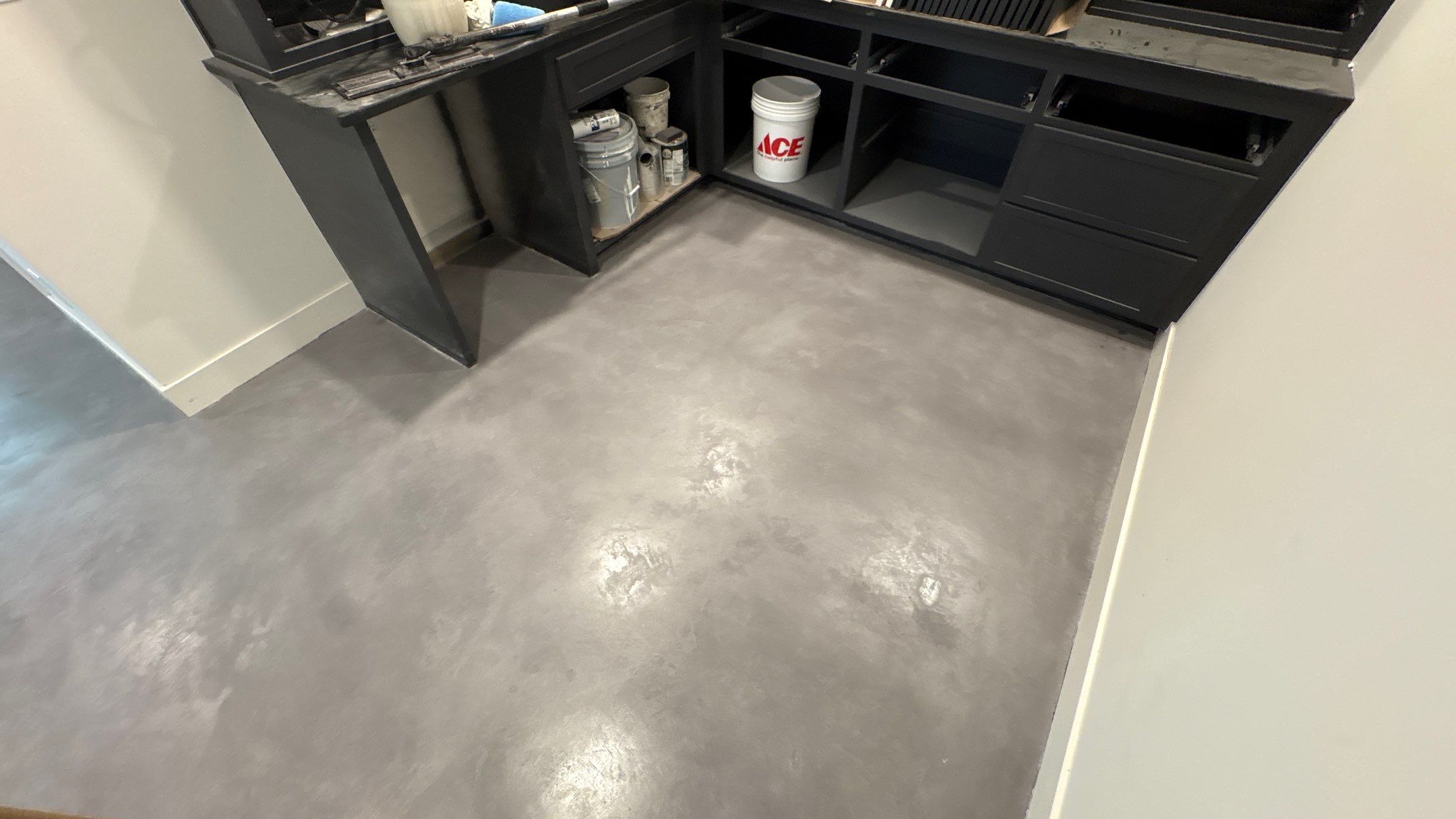 Basement Floor Overlay - Lawrence, KS by Big Red Decorative Concrete, LLC