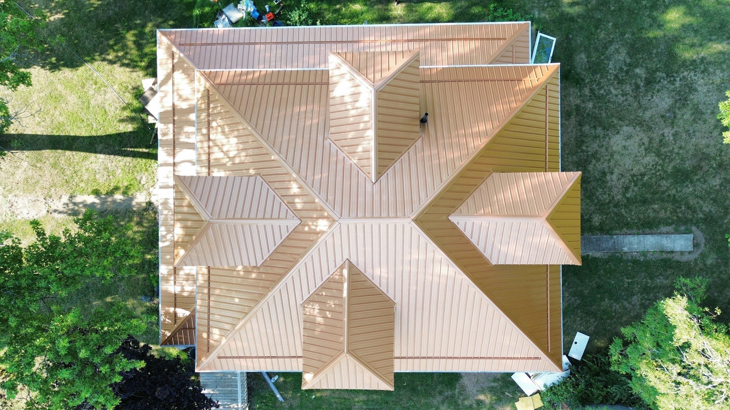 Residential Roofing Installation using Performance Panel Metal - Copper Metallic by RoofX 