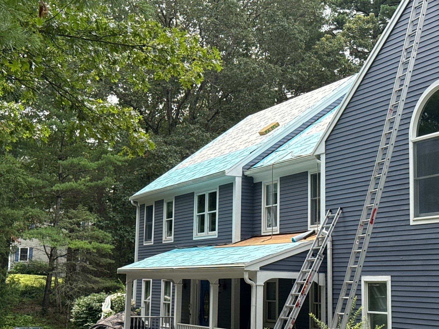 Solar-Ready Roof Replacement with GAF Pewter Gray Shingles & VELUX Skylights by Sensible Home Solutions