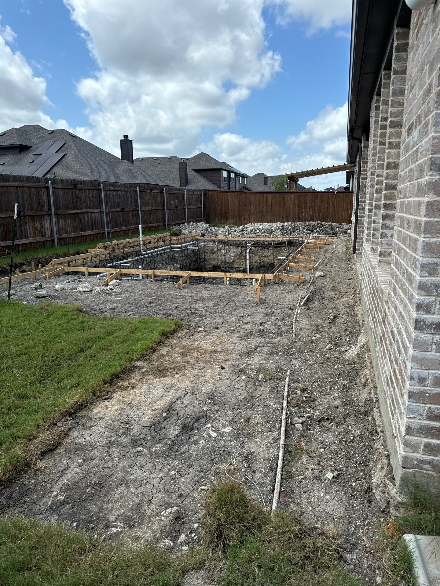 Geometric Pool with Tanning Ledge by Pinnacle Pools and Spas - DFW