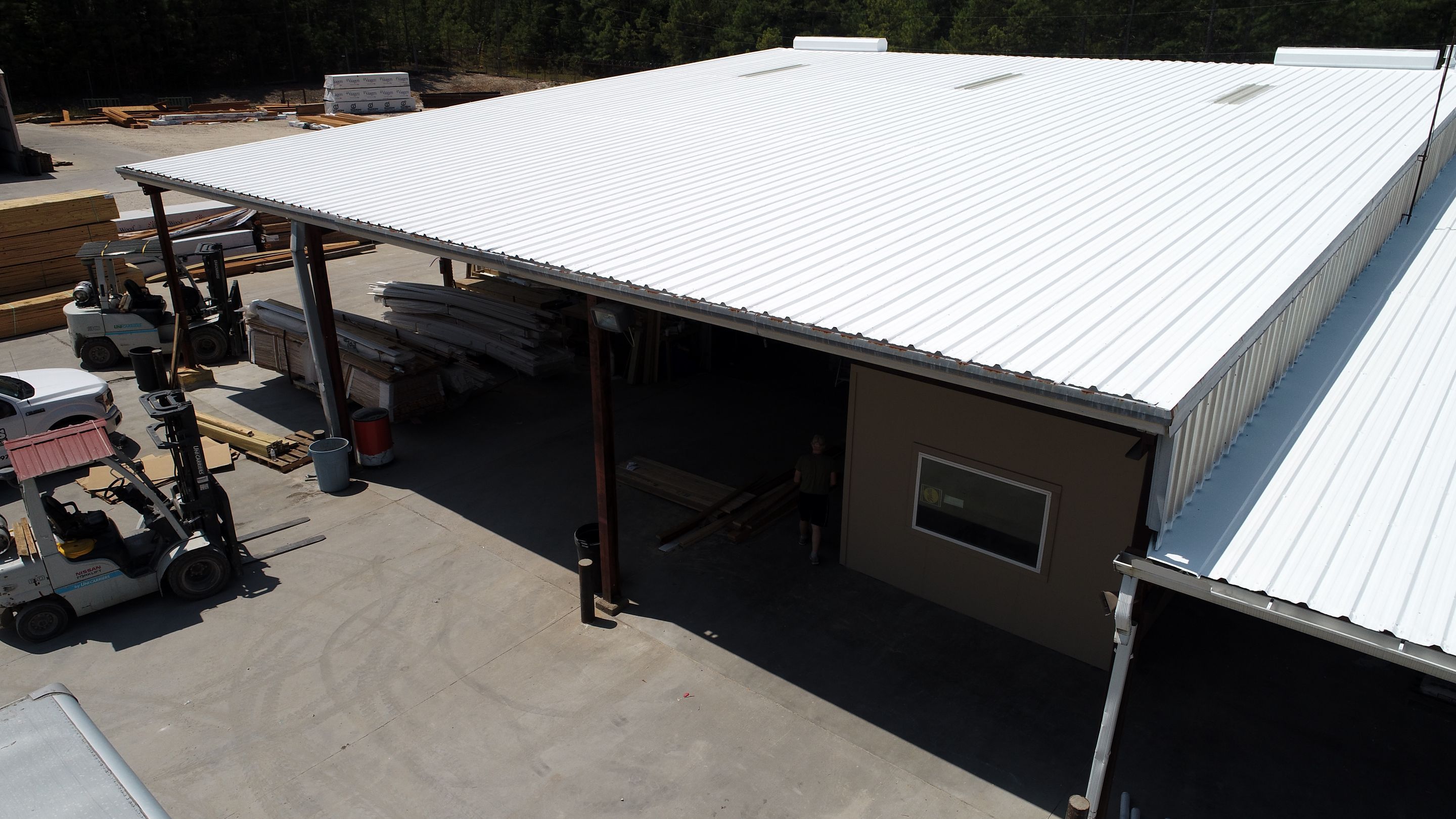 Commercial Roofing Installation using Aldocoat Coatings by Hostetler Roofing