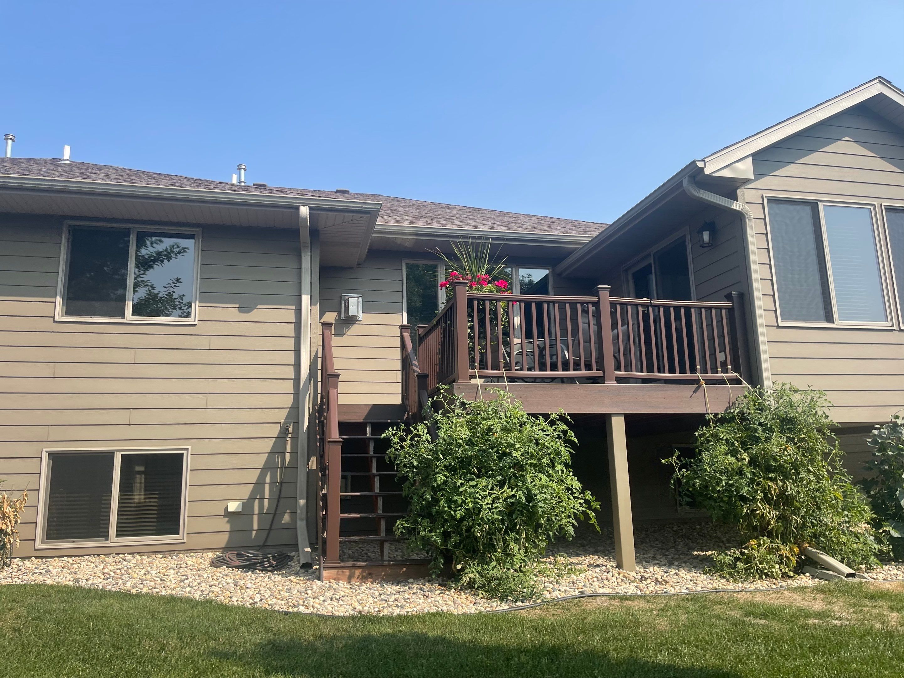 Residential Exterior Siding and Trim Painting in Sioux Falls by Select Painting, Coatings & Garage Cabinets
