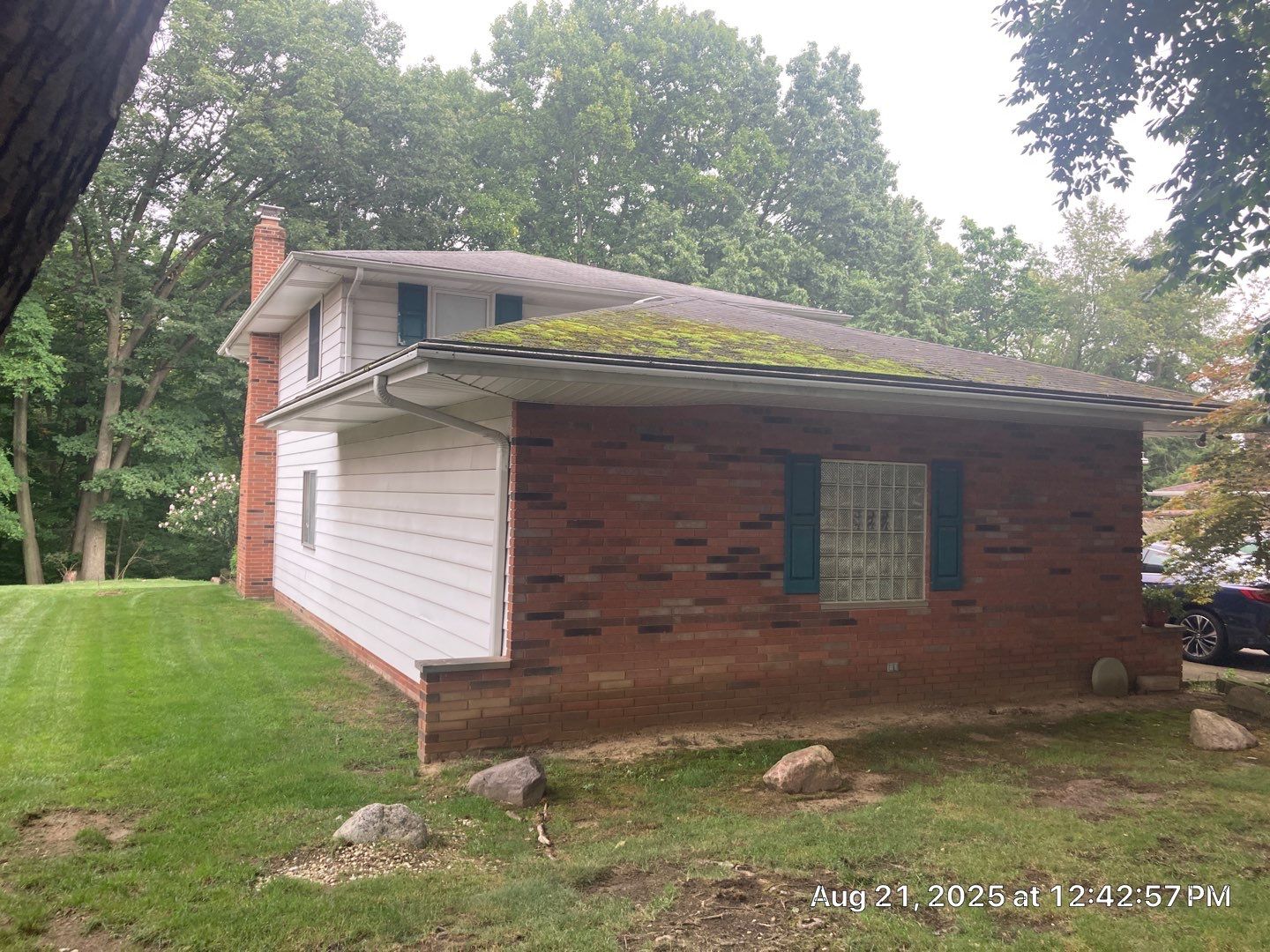 Shingle Roof Replacement by Absolute Roofing and Construction