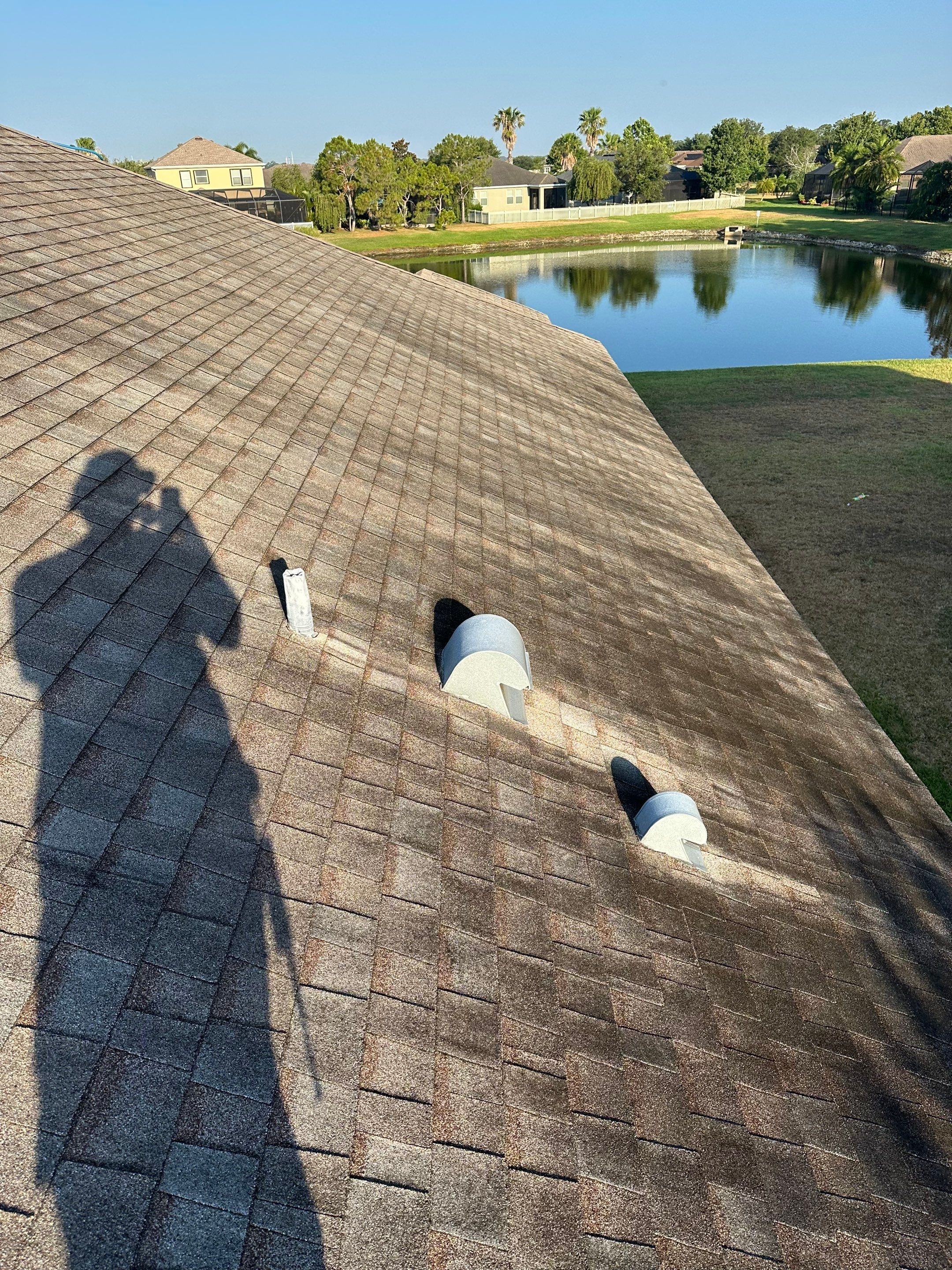 Asphalt Shingle Roof Soft Wash Cleaning & Concrete Pressure Washing in CopperStone Community, Parrish, FL by Sunshine AquaWash