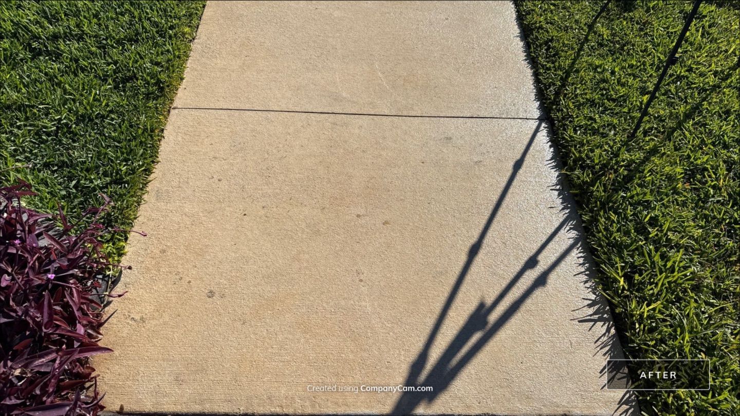 Rust Stain Removal from Concrete Driveway and Pavers in Park East at Azario | Lakewood Ranch, FL by Sunshine AquaWash