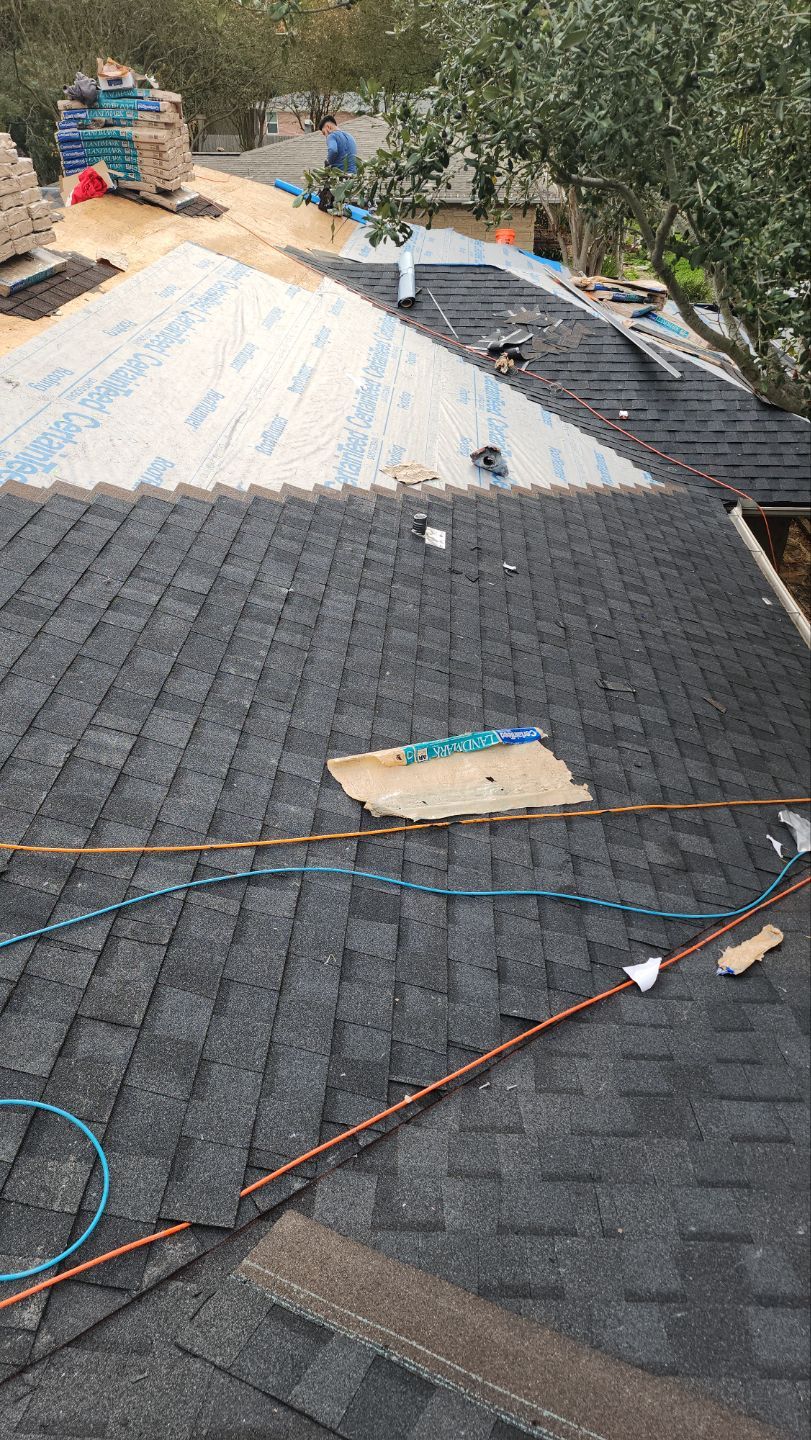 Residential Roofing Installation using Certainteed Landmark Moire Black by Galvan Roofing and Construction