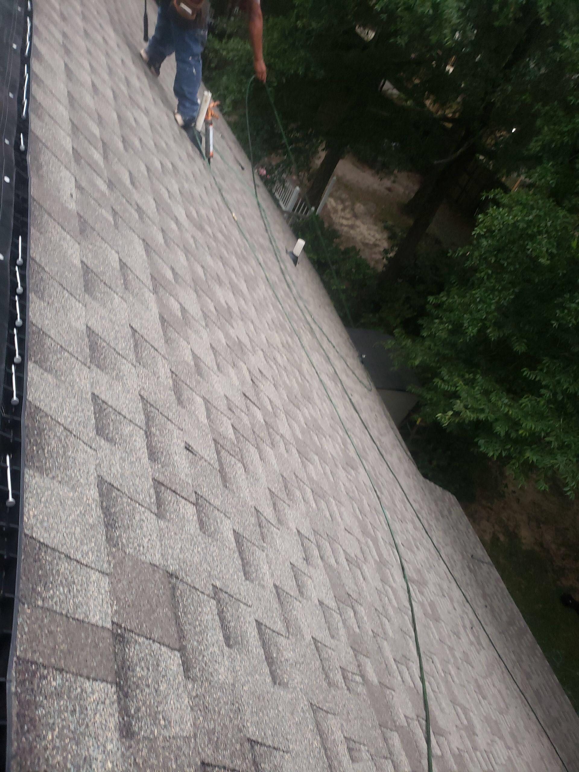 Residential Roofing Installation using Roof Replacement by American Roofing & Construction LLC