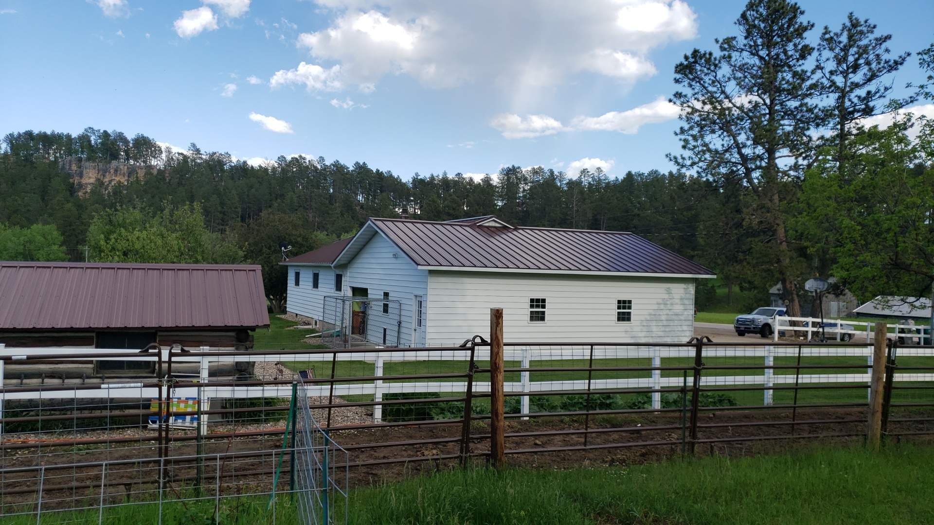 Ribbed Steel Roof Farmhouse Style by Weather-Tite Exteriors LLC