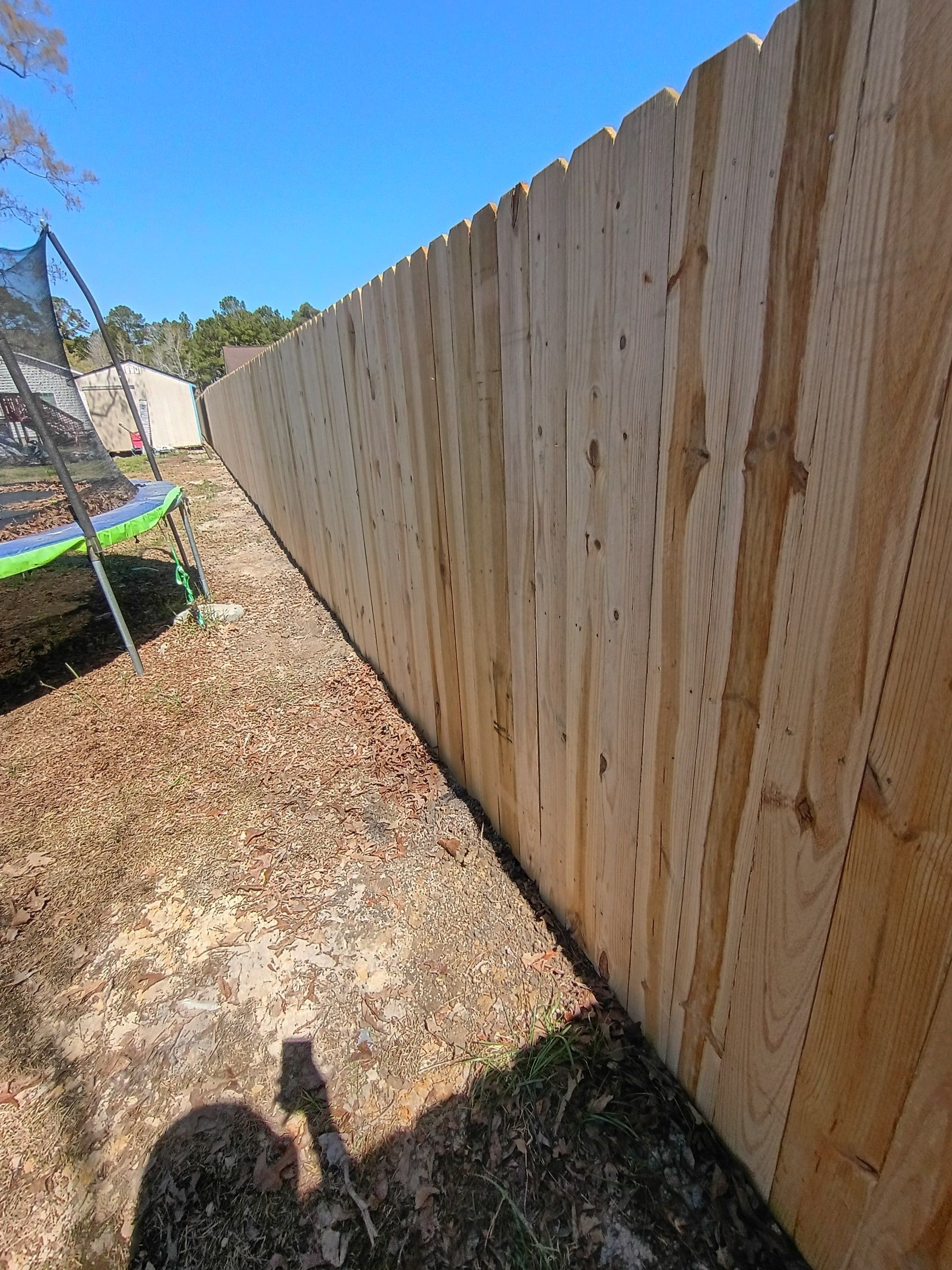 Wood Privacy Fence Installation in Hubert, NC by Superior Fence and Rail