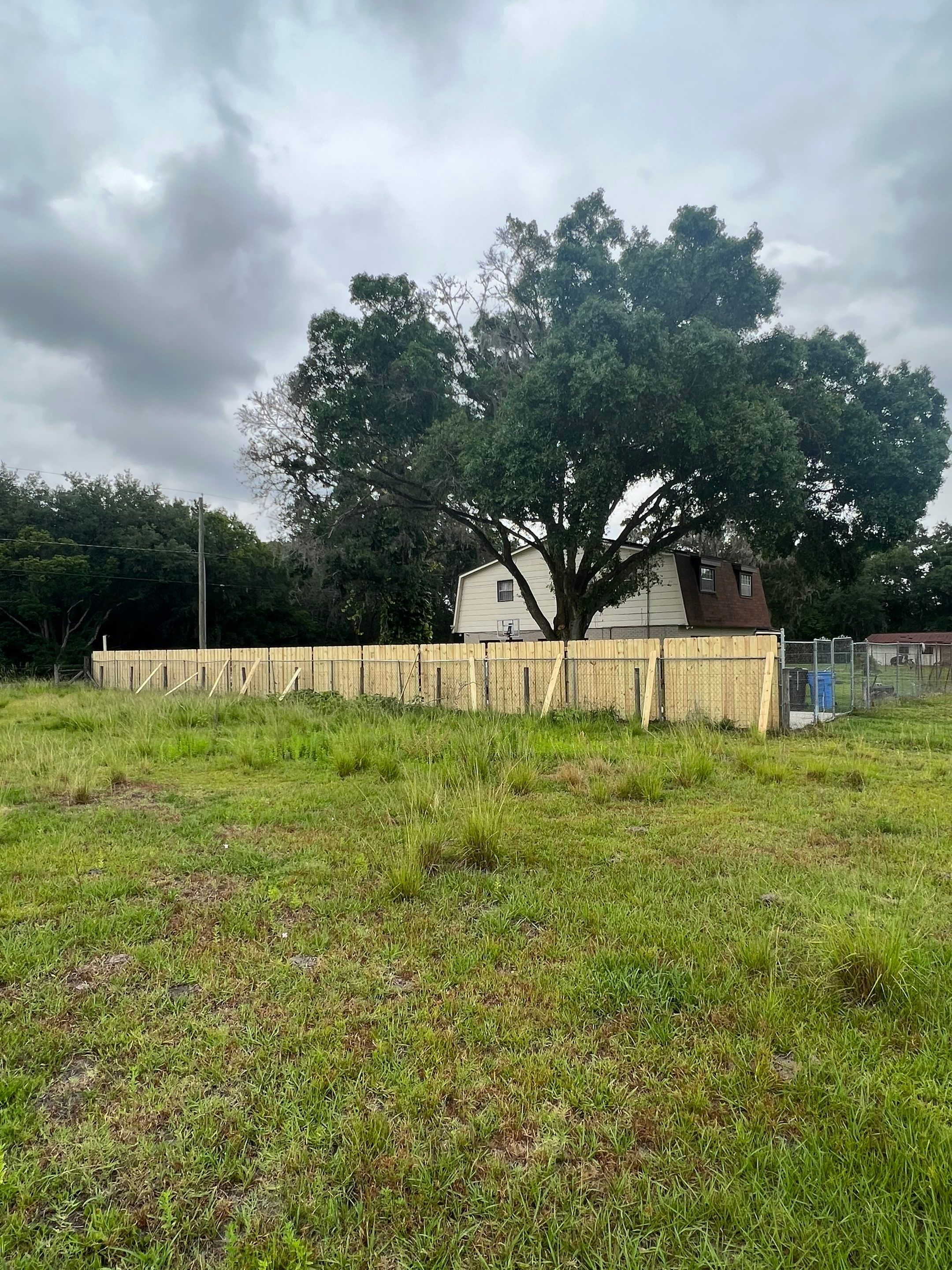 Dover, FL 6ft. Treated Board on Board Privacy Fence  by Asap fence and gates, LLC